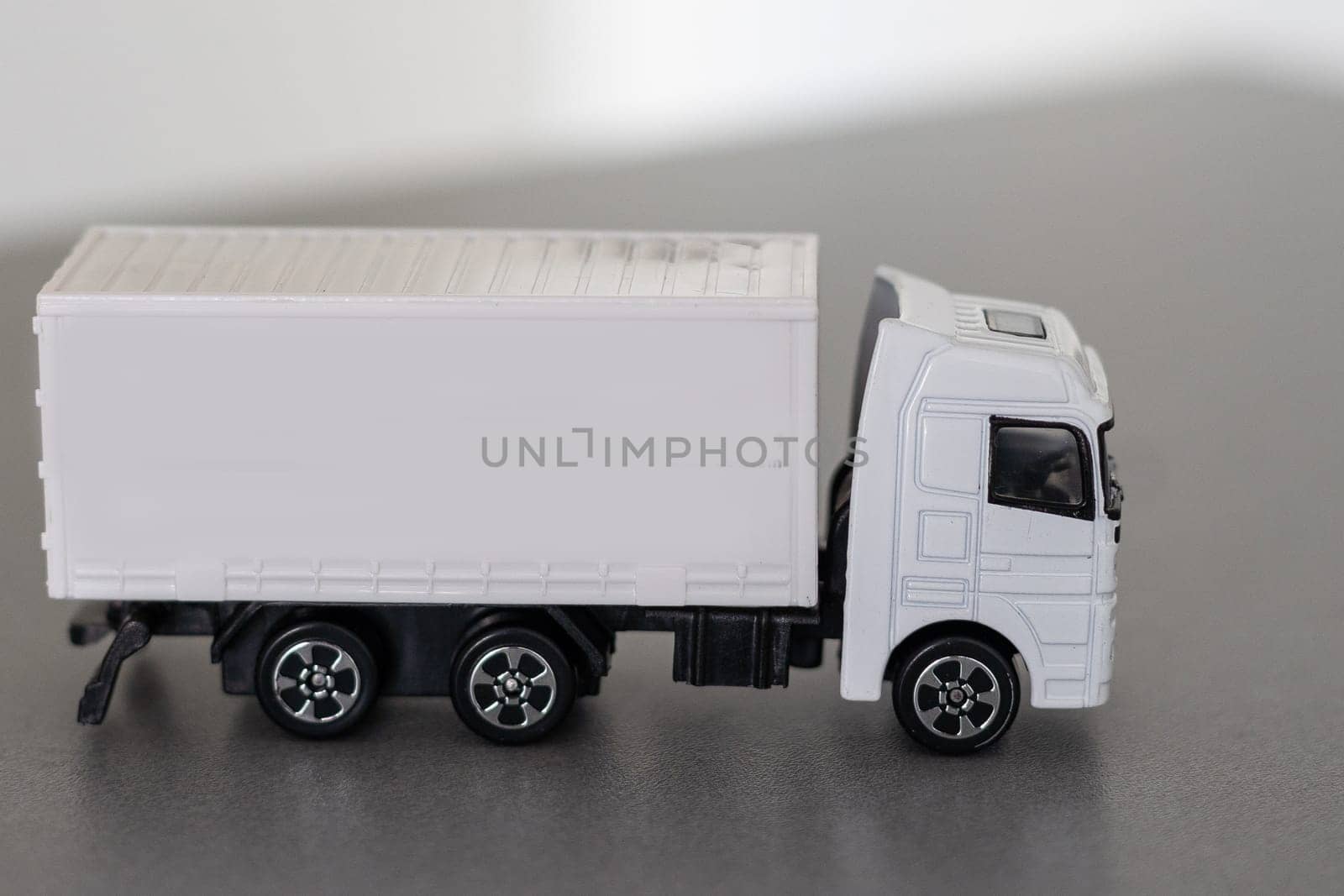 White cargo delivery truck miniature isolated on white background with clipping path. High quality photo
