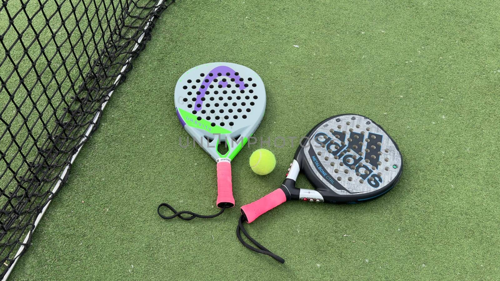 Kyiv, Ukraine, May 15, 2024 paddle tennis racket and balls, padel game kit. High quality photo