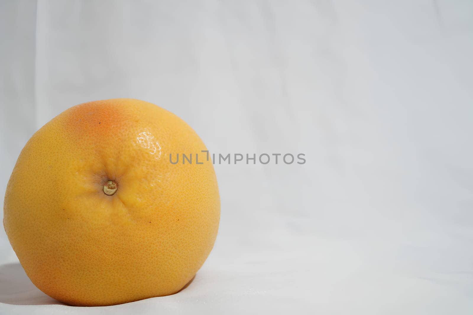 Ripe Grapefruit on White Background. High quality photo