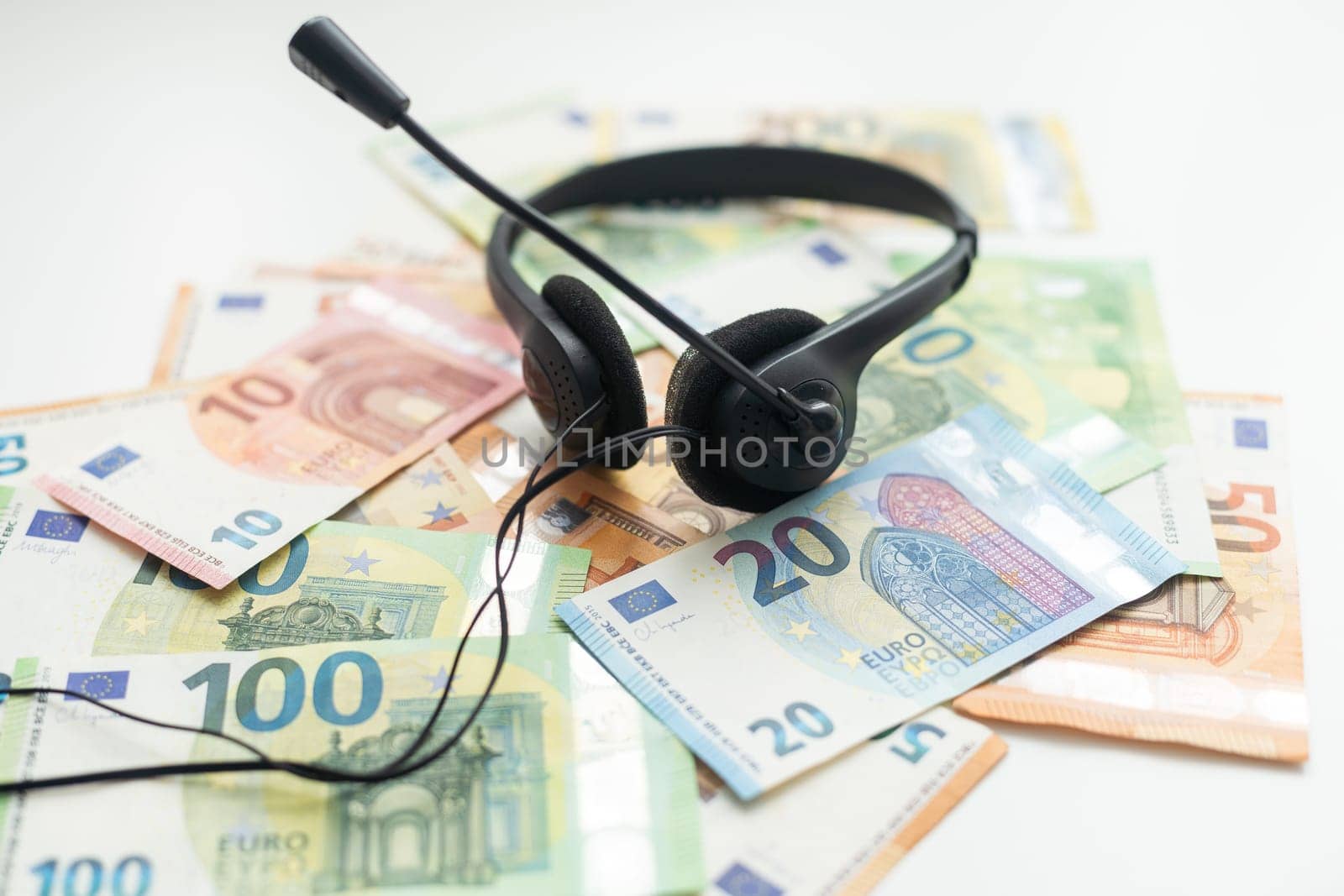 euro banknotes headphones headset, business. High quality photo