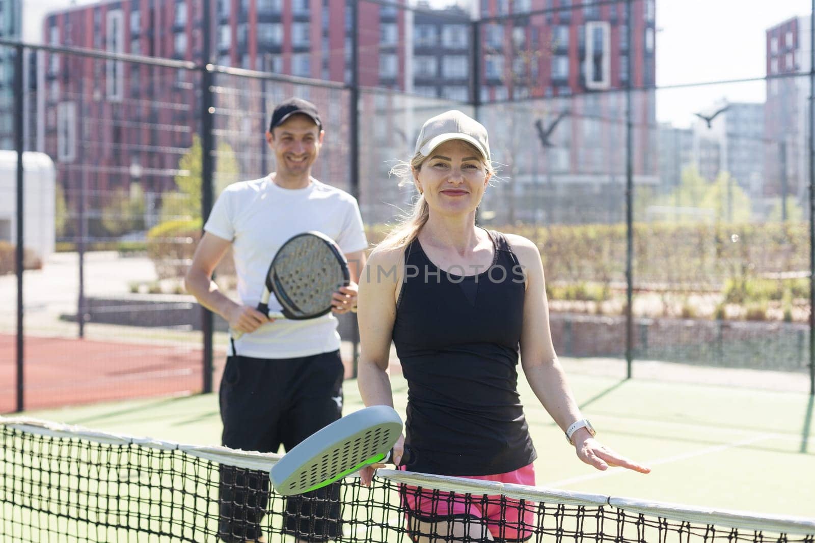 paddle tennis couple players ready for class. High quality photo