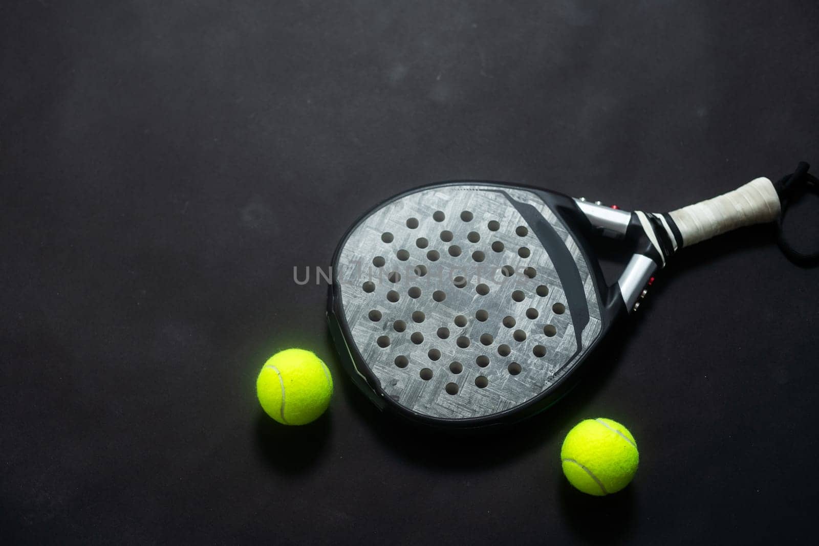 ball racket paddel black background. High quality photo