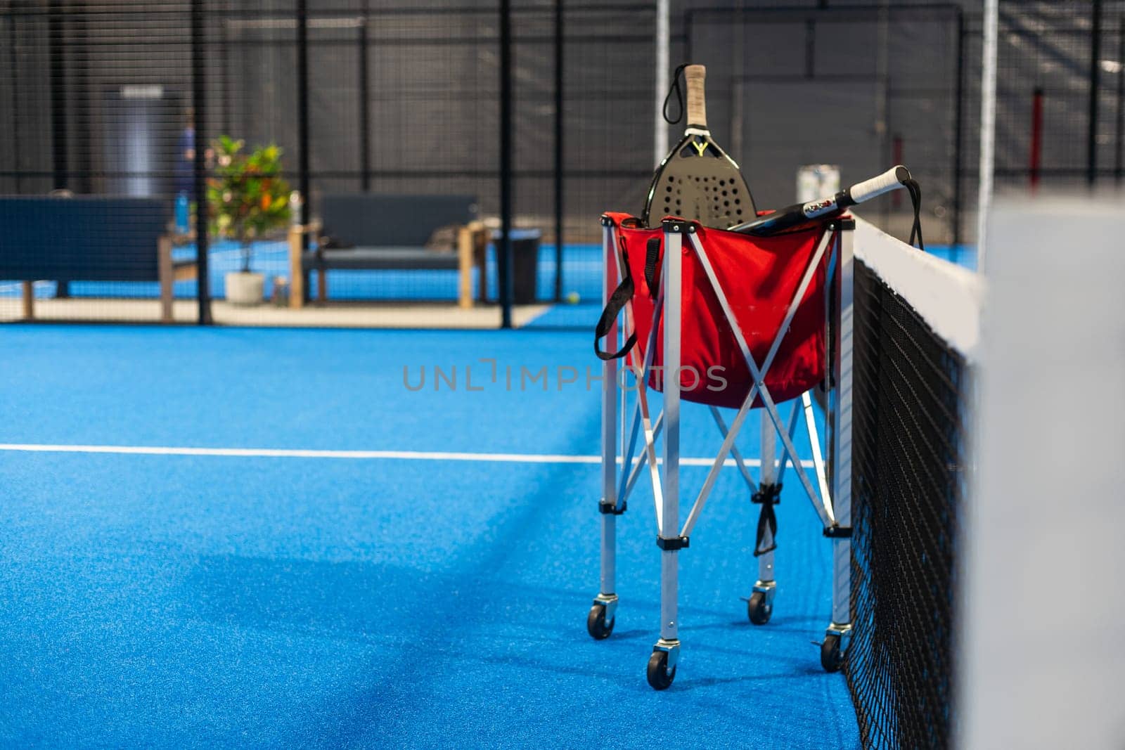 Paddle objects on blue court. High quality photo