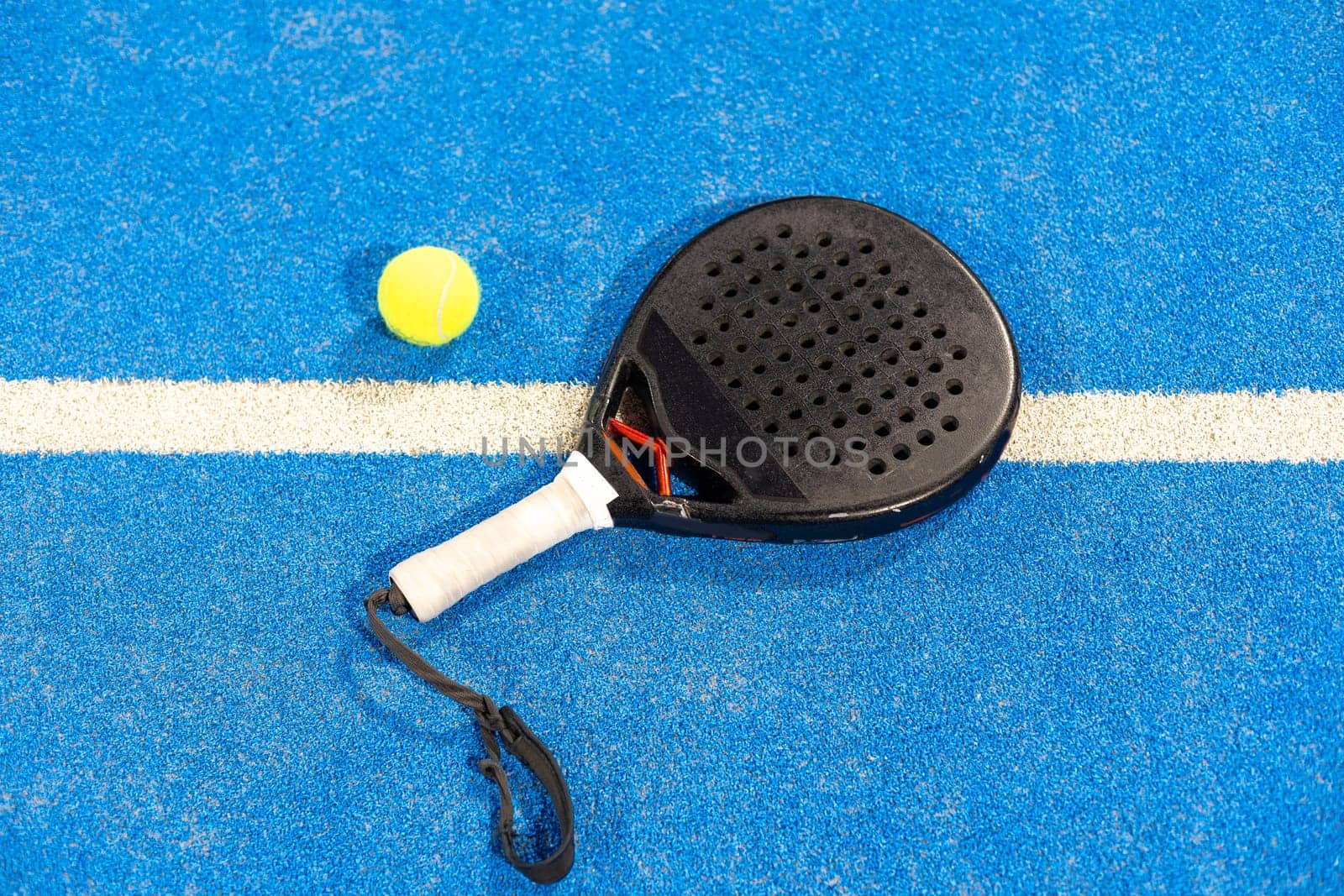 Paddle tennis objects and court. High quality photo