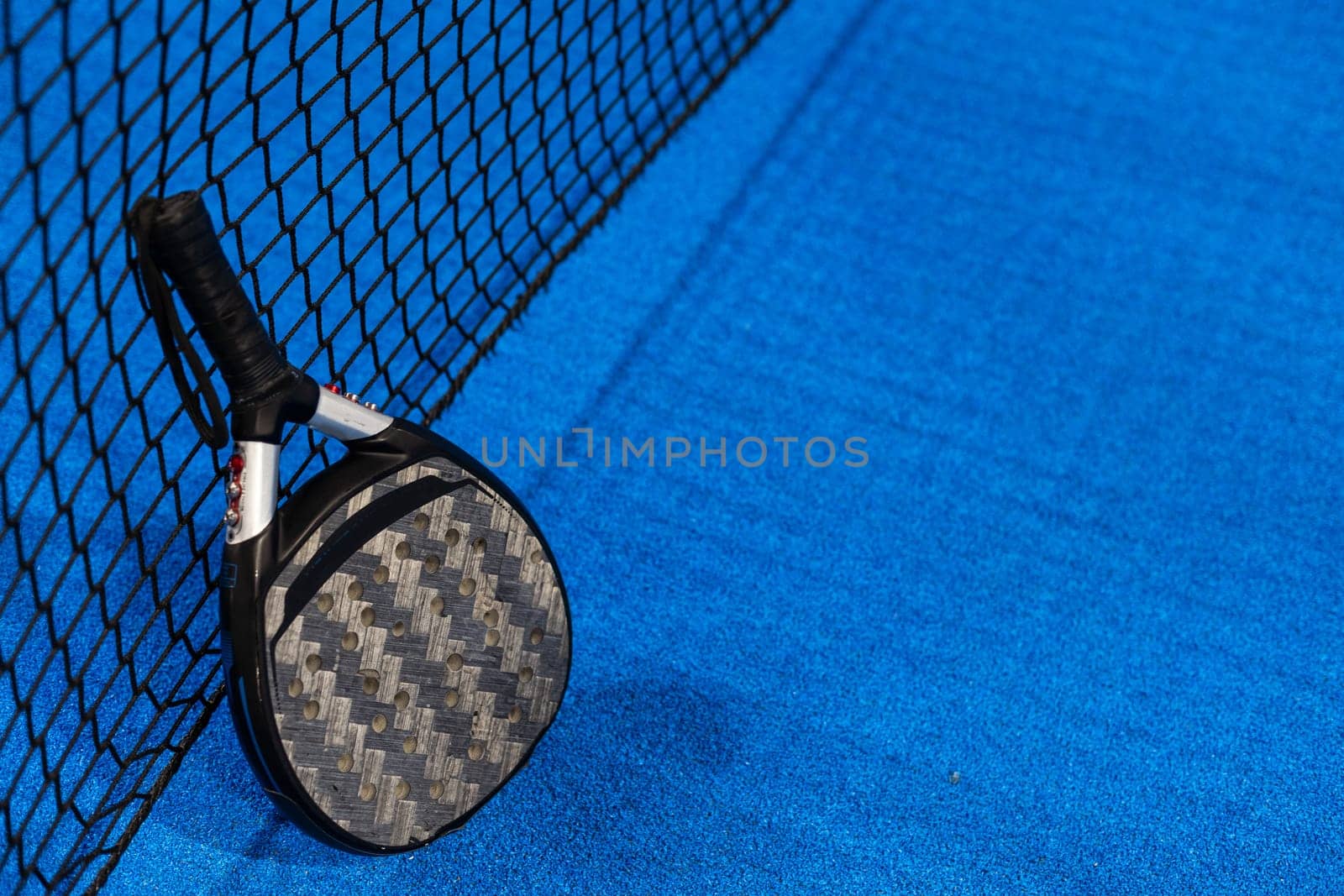 Paddle tennis objects and court. High quality photo