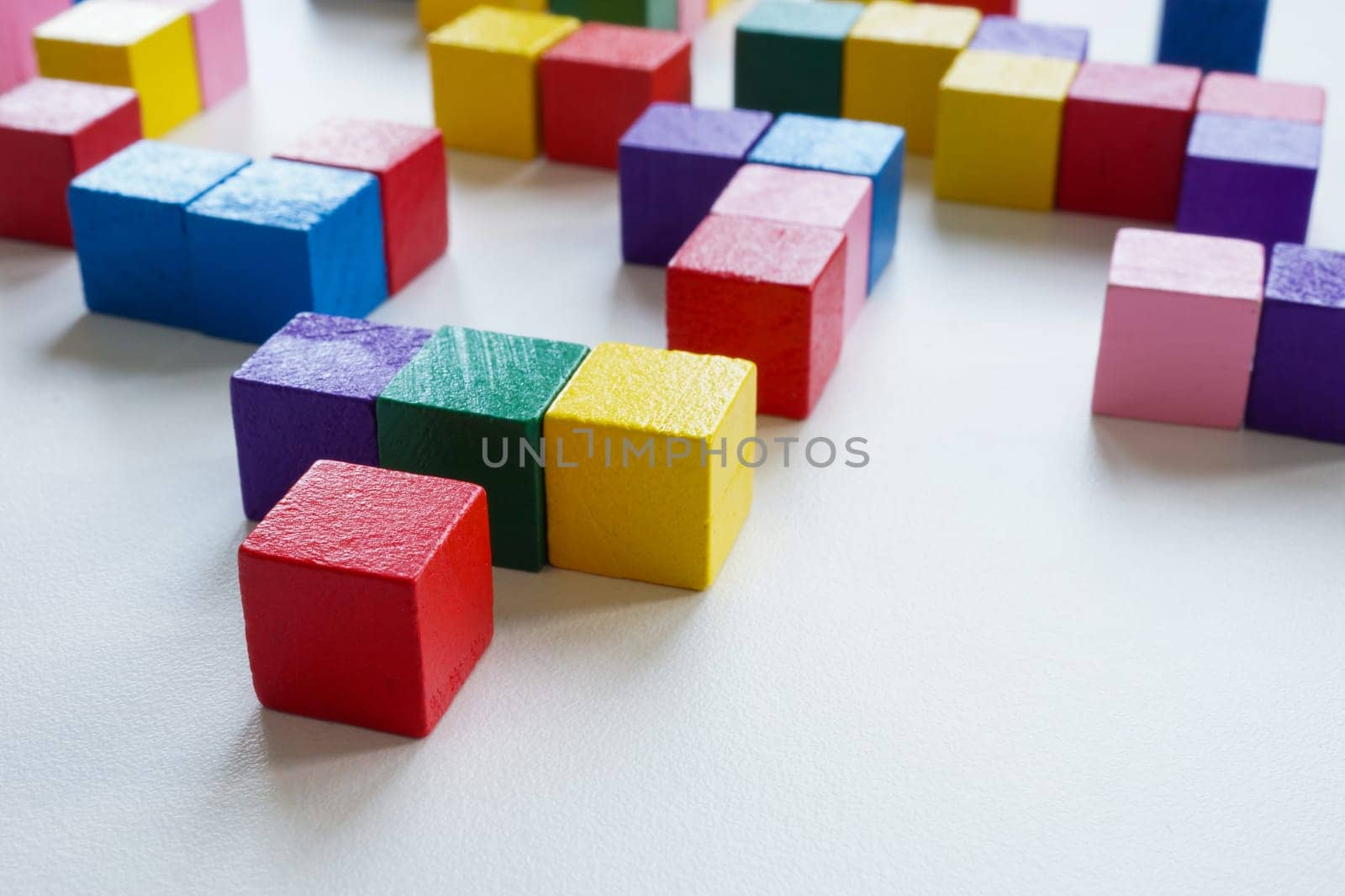 Abstract labyrinth of colored cubes as symbol of complex system and diversity.