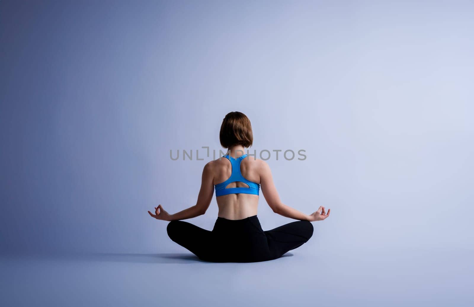 Full body length back rear view gaiety shot athletic and sporty woman doing healthy and meditative yoga exercise workout posture on isolated background. Healthy active and body care lifestyle