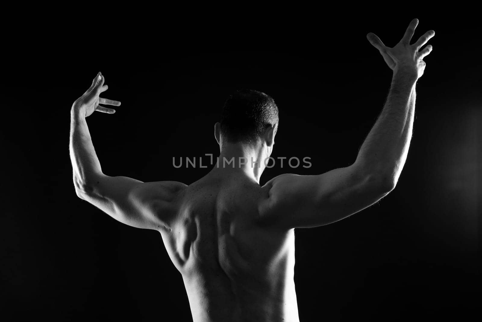 Portrait of man, bodybuilder and bicep flex in studio, background and exercise for muscular power. by Zelenin