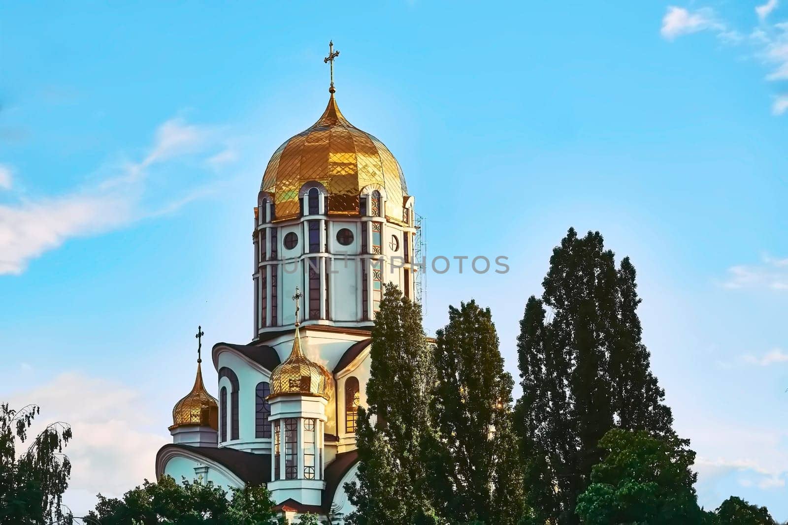 Christian cathedral with golden domes and blue clear sky by jovani68