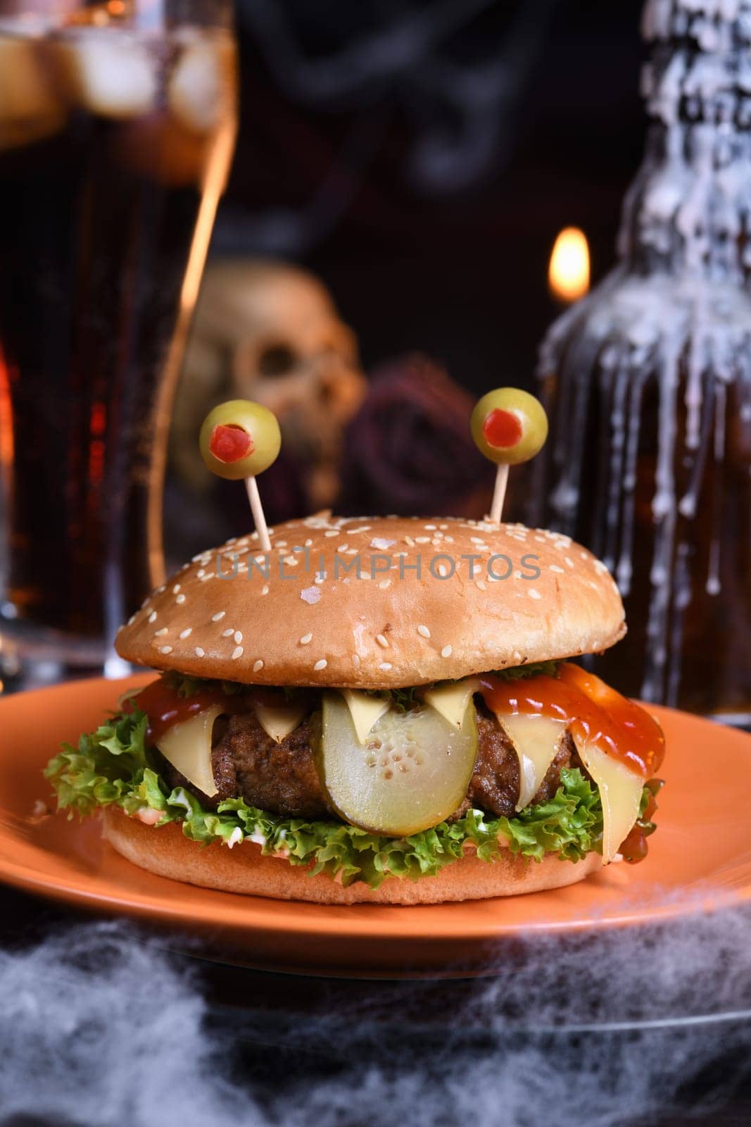 The Monster Burger will definitely lift your spirits and is the perfect snack for a Halloween party.