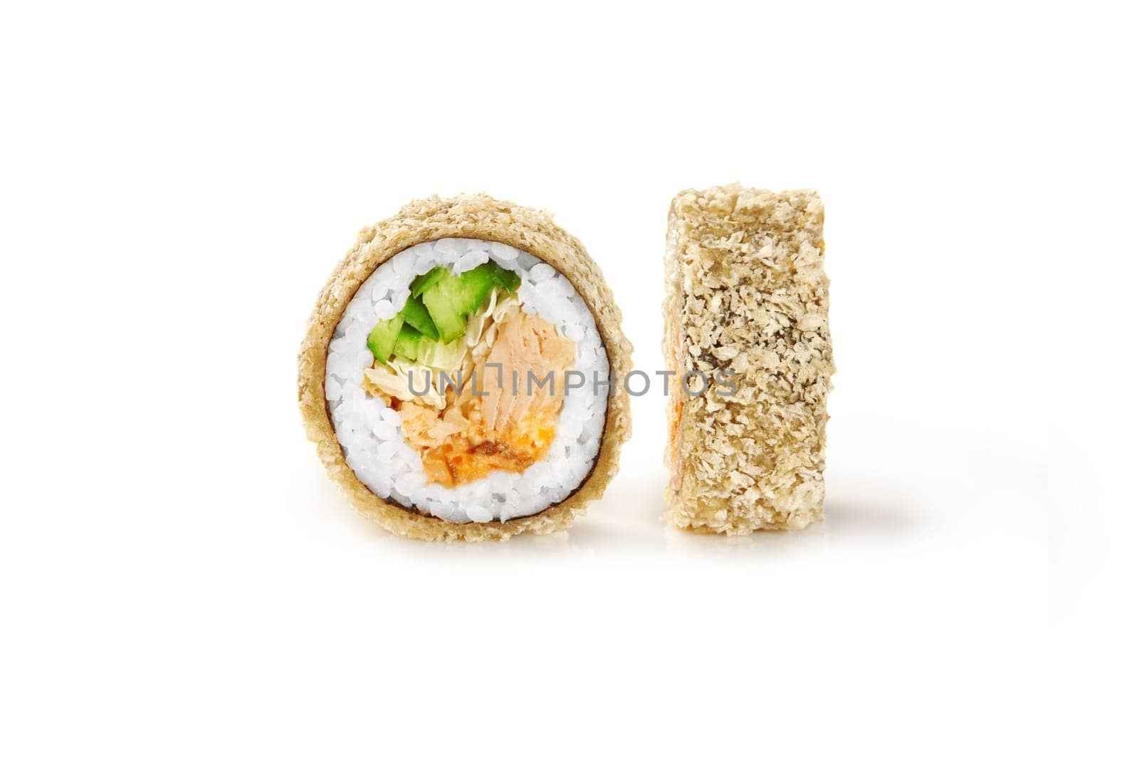 Closeup detailed view of tempura roll with baked salmon, omelet, caramelized onion, napa cabbage and cucumber covered with crispy panko breadcrumbs, isolated on white. Japanese cuisine