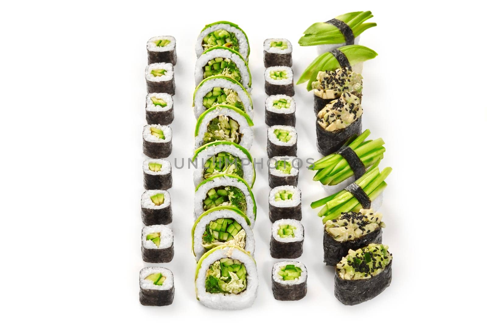 Assorted vegetarian sushi rolls with fresh green vegetables by nazarovsergey