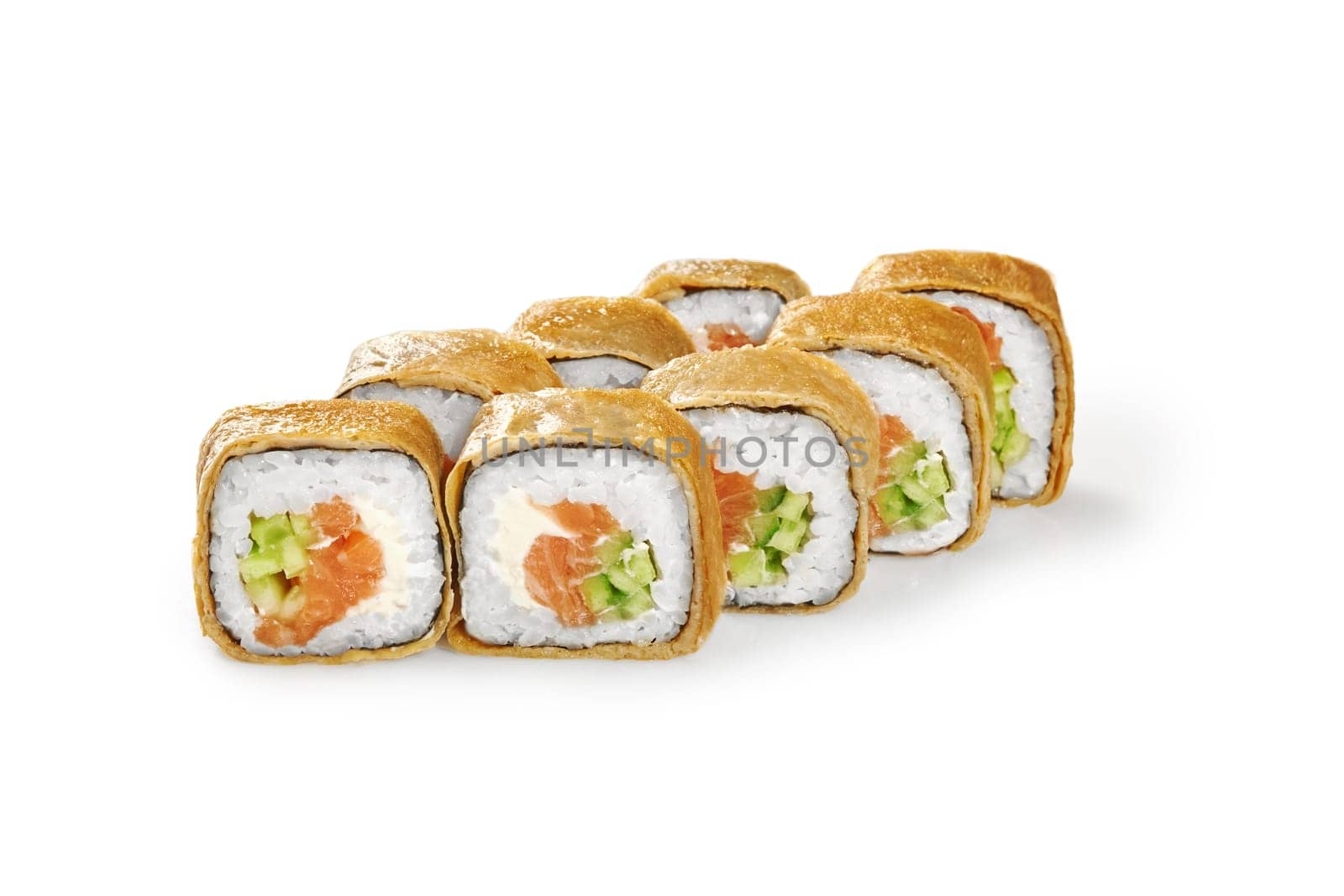 Delicious crepe sushi roll filled with salmon, fresh cucumber and cream cheese, closeup view isolated on white background. Japanese style cuisine