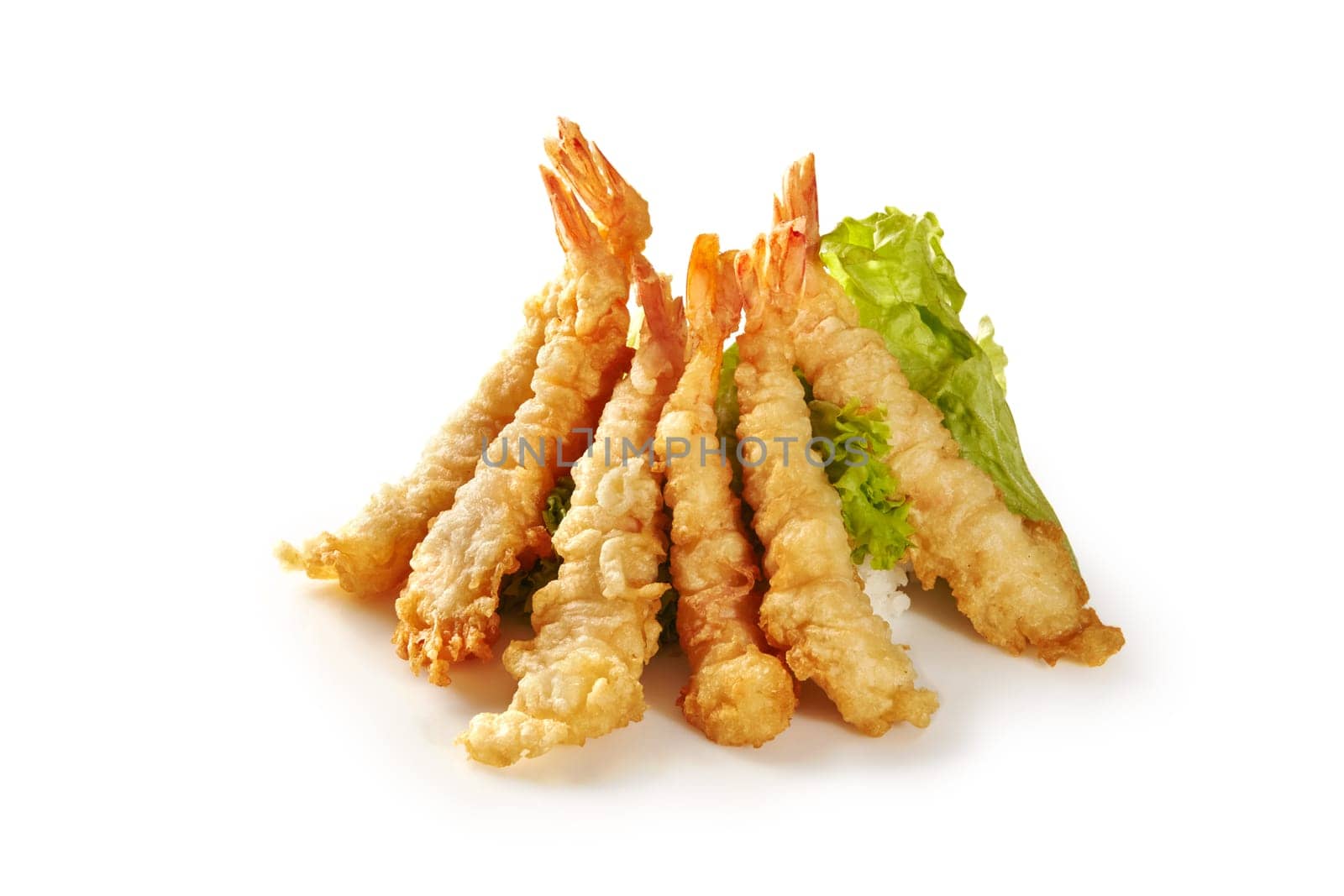 Teepee arrangement of golden crispy tempura tiger shrimps paired with rice and fresh green lettuce, showcasing Japanese cooking technique