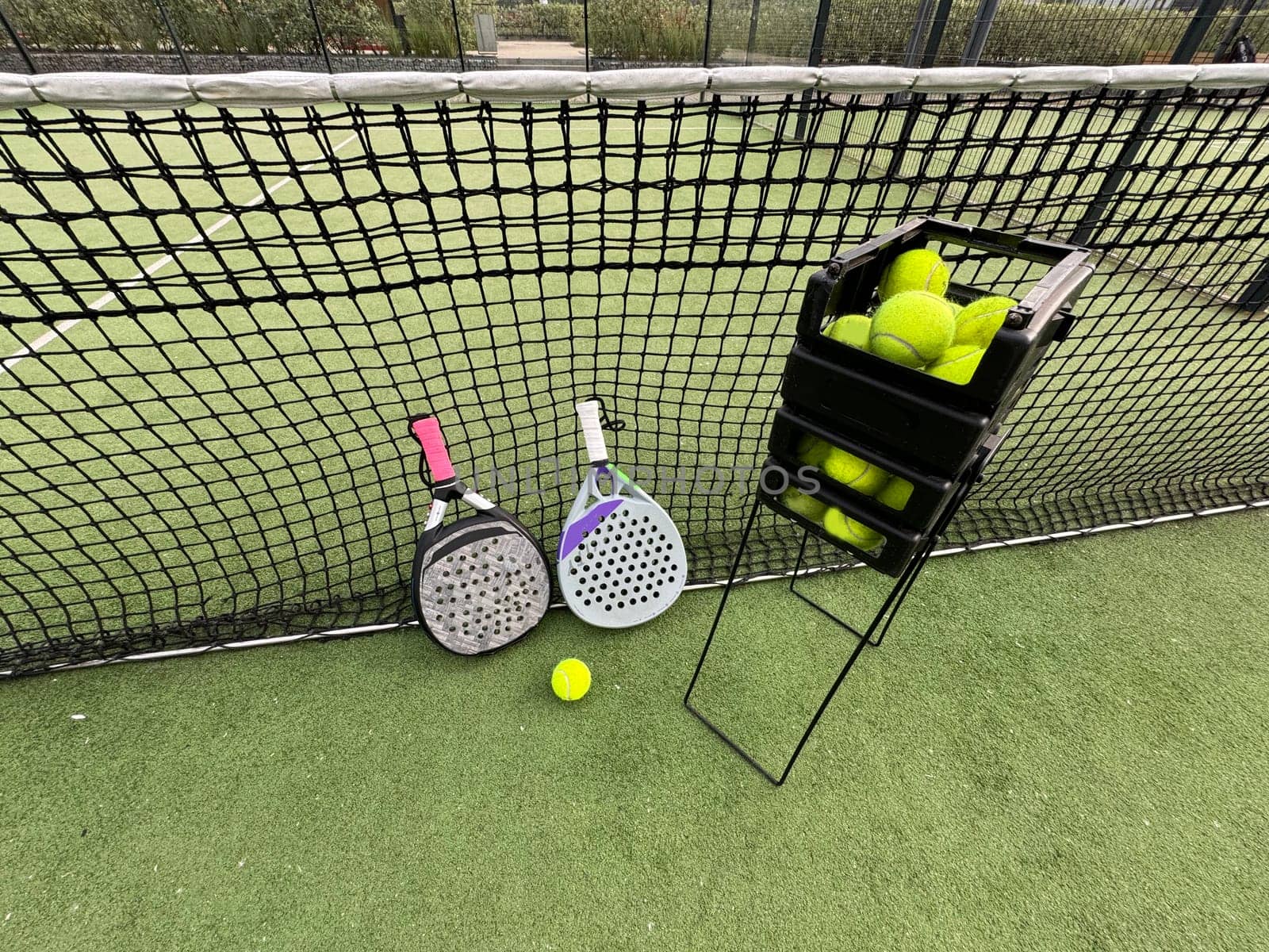 padel tennis racket sport court and balls. High quality photo