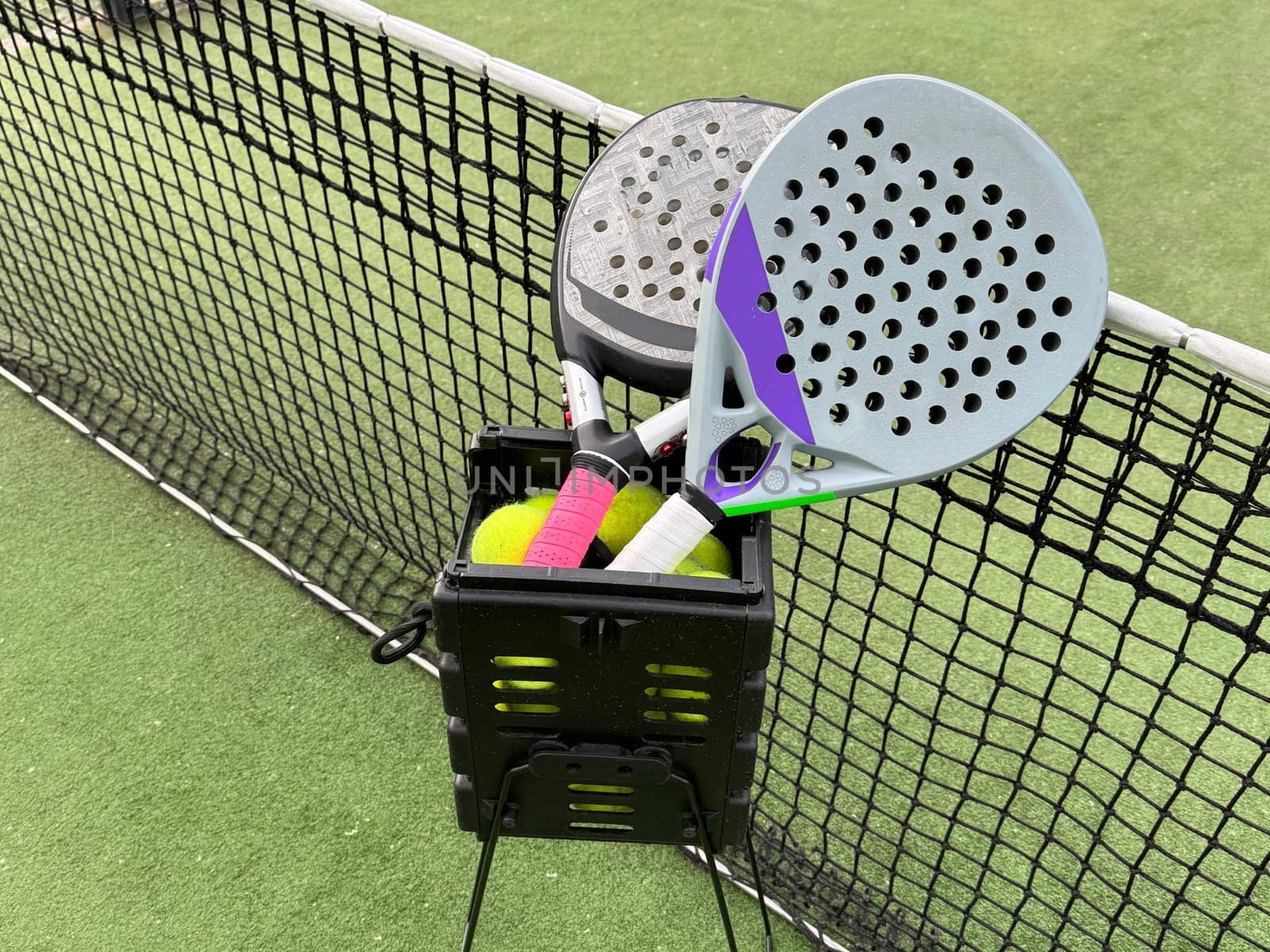 padel tennis racket sport court and balls. High quality photo