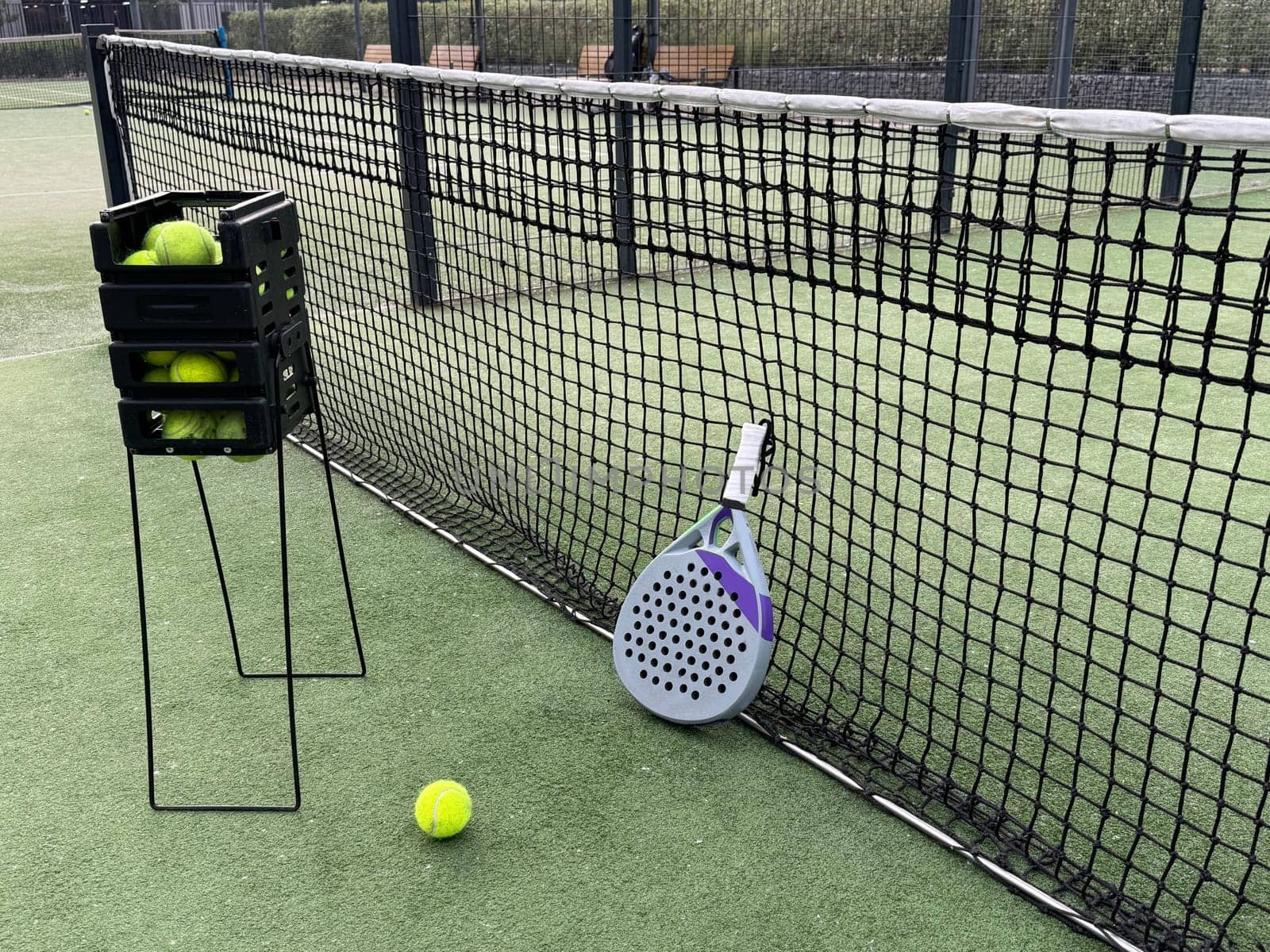 padel tennis racket sport court and balls. High quality photo