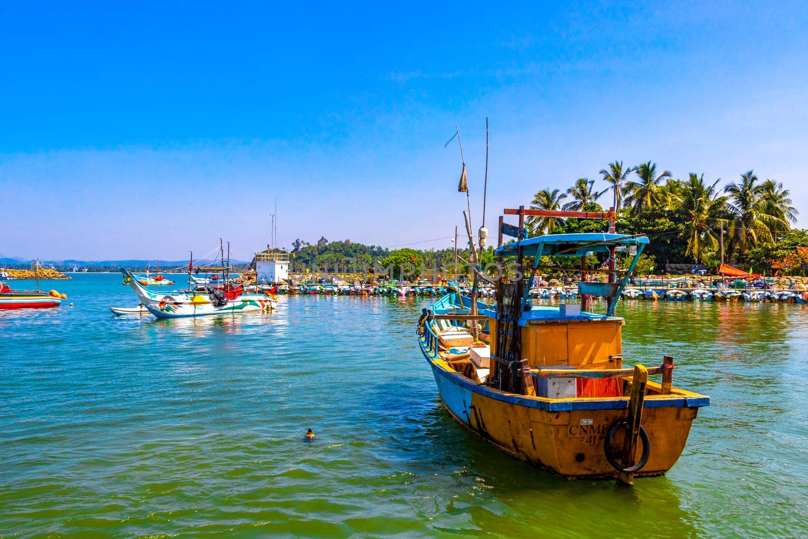 Mirissa Fisheries Harbor with boat boats ships catamaran Sri Lanka. by Arkadij