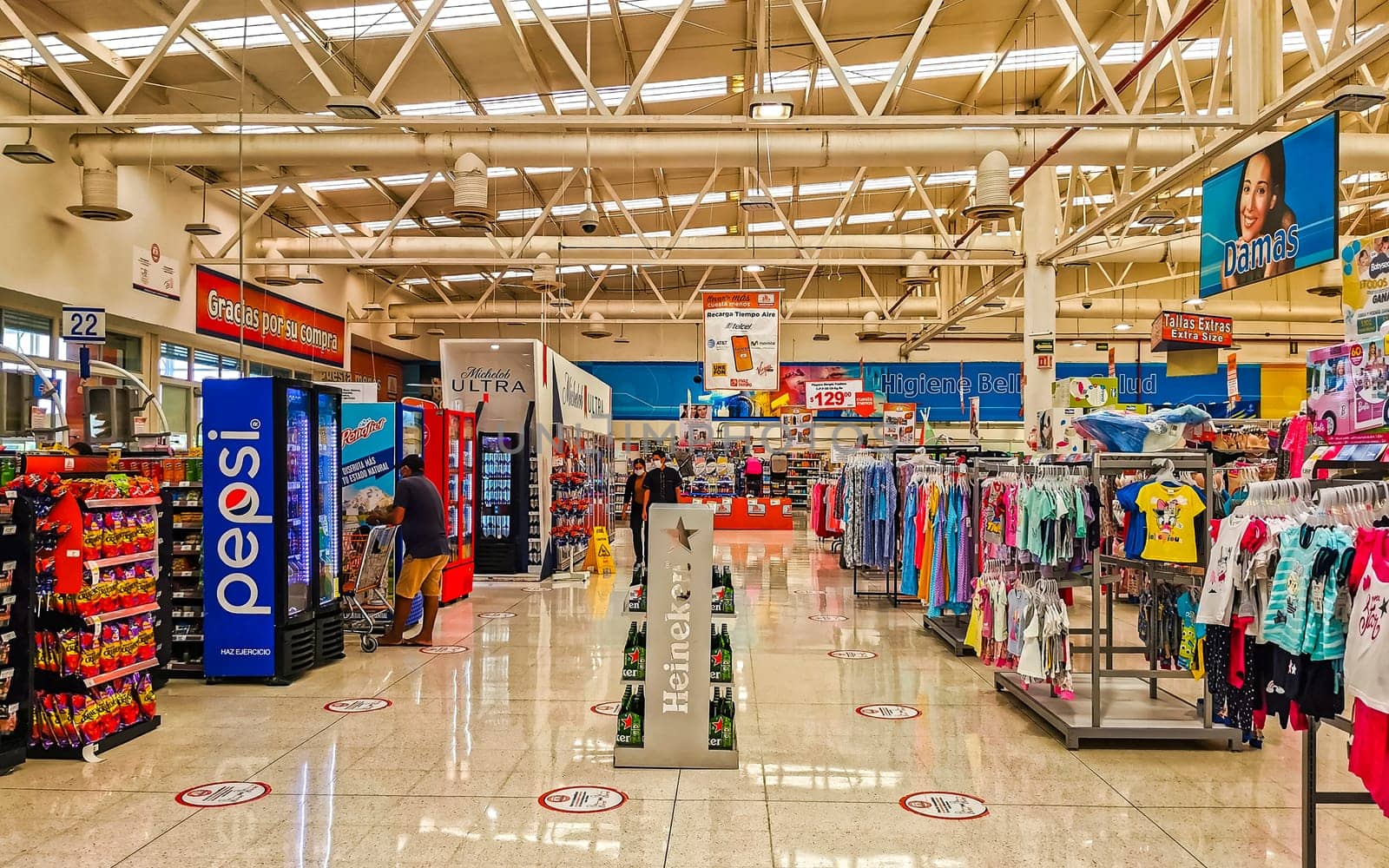 Supermarket from the inside Shelves Goods People Shopping carts Products Aisles in Playa del Carmen Quintana Roo Mexico.