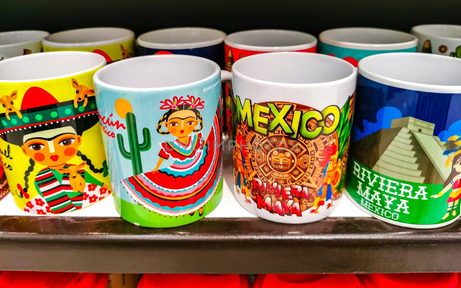 Mexican Mayan souvenirs cups supermarket shelf Playa del Carmen Mexico. by Arkadij