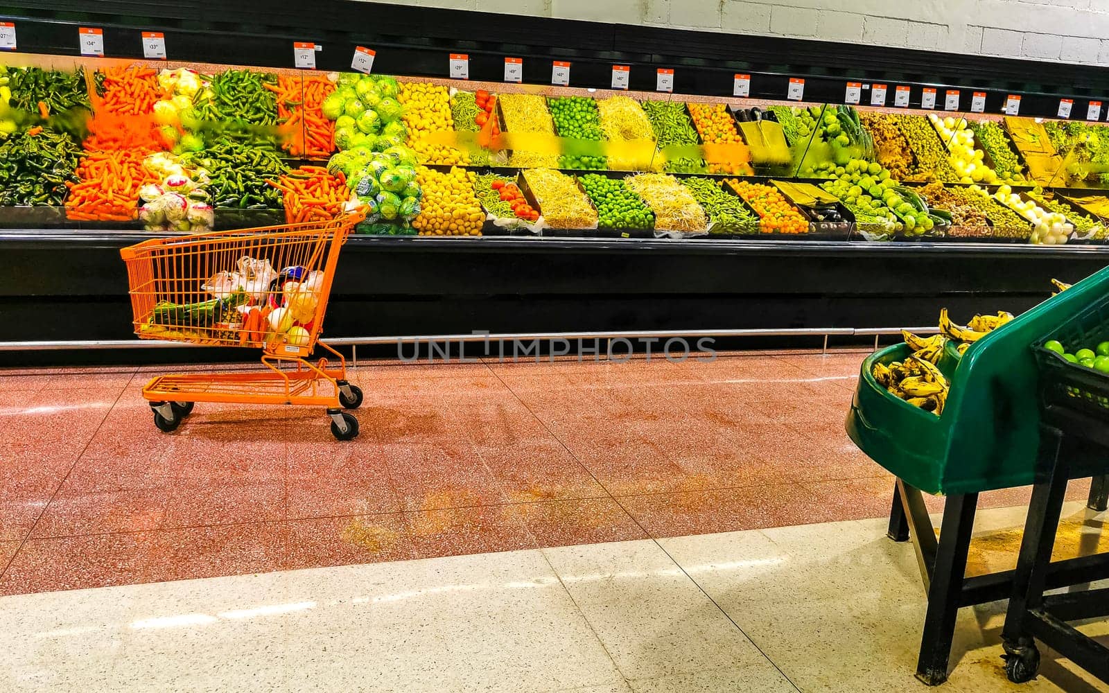 Supermarket from the inside Shelves Goods People Shopping carts Products Aisles in Playa del Carmen Quintana Roo Mexico.