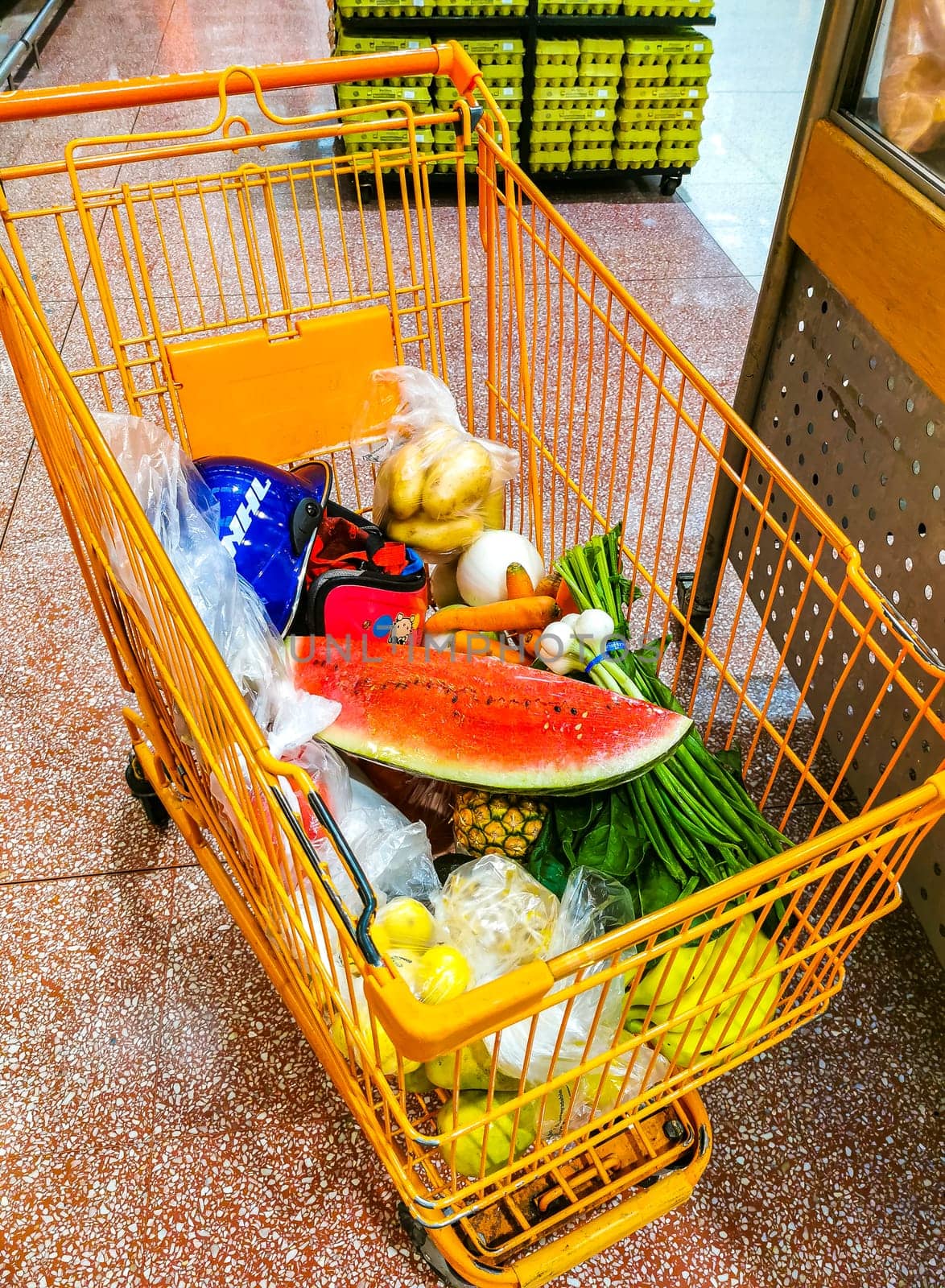 Supermarket from the inside Shelves Goods People Shopping carts Products. by Arkadij