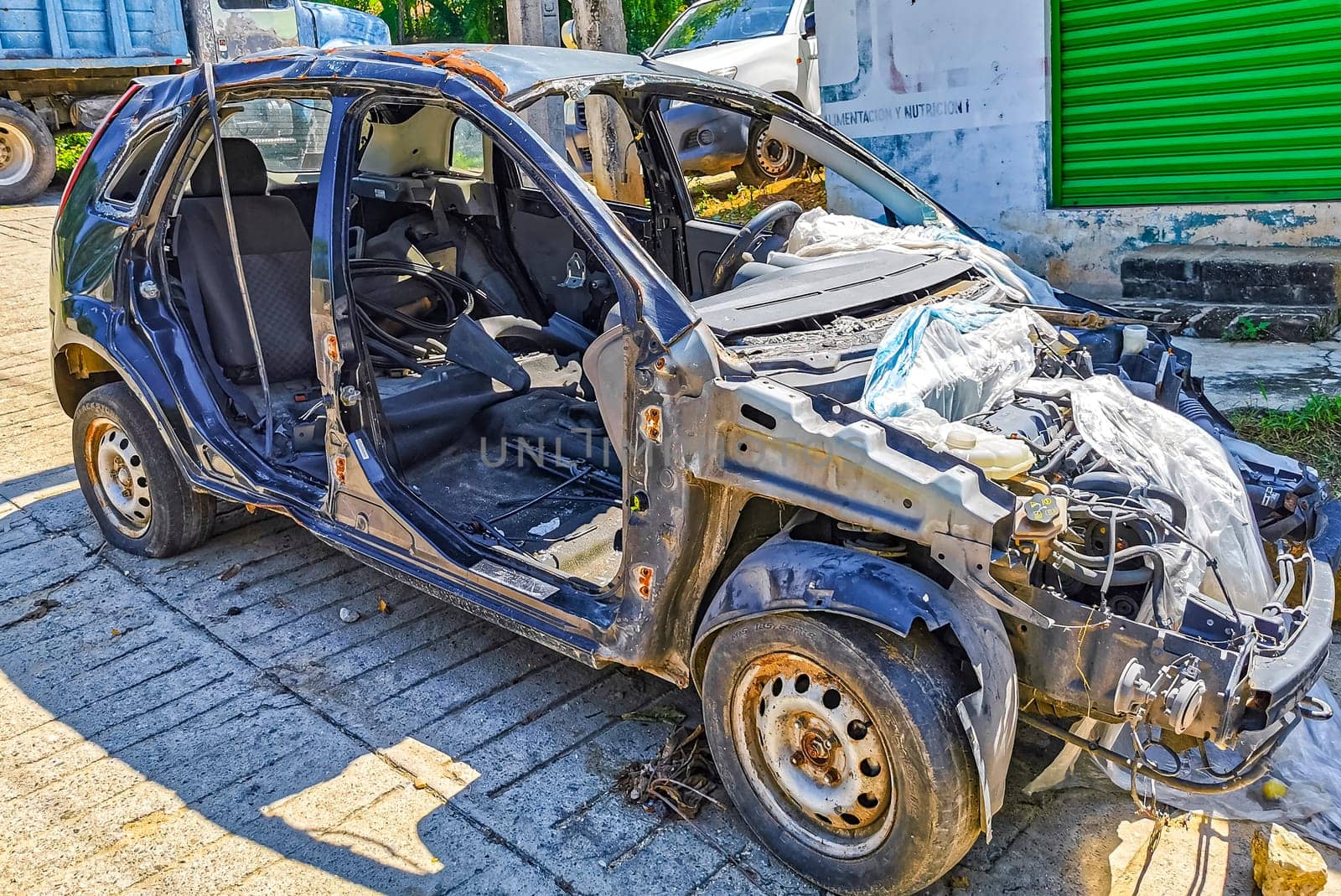 Broken down car Vehicle transportation in the workshop outside in Zicatela Puerto Escondido Oaxaca Mexico.