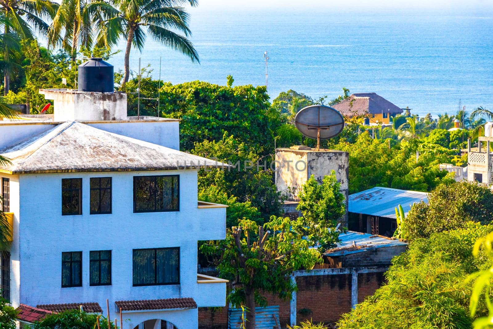 View of the Pacific Ocean and tropical jungle panorama Mexico. by Arkadij