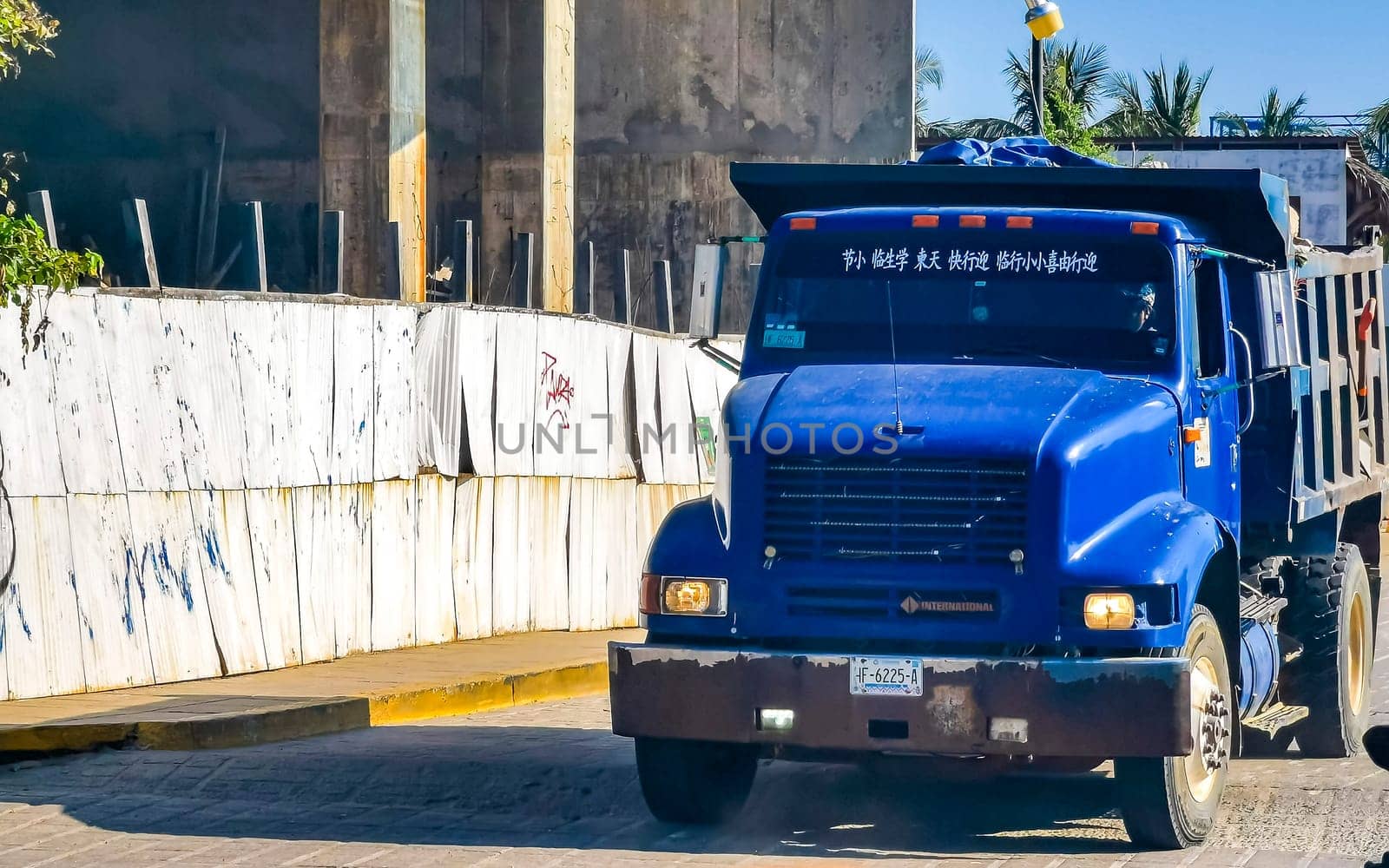 Mexican tipper dumper dump truck trucks transporter in Mexico. by Arkadij
