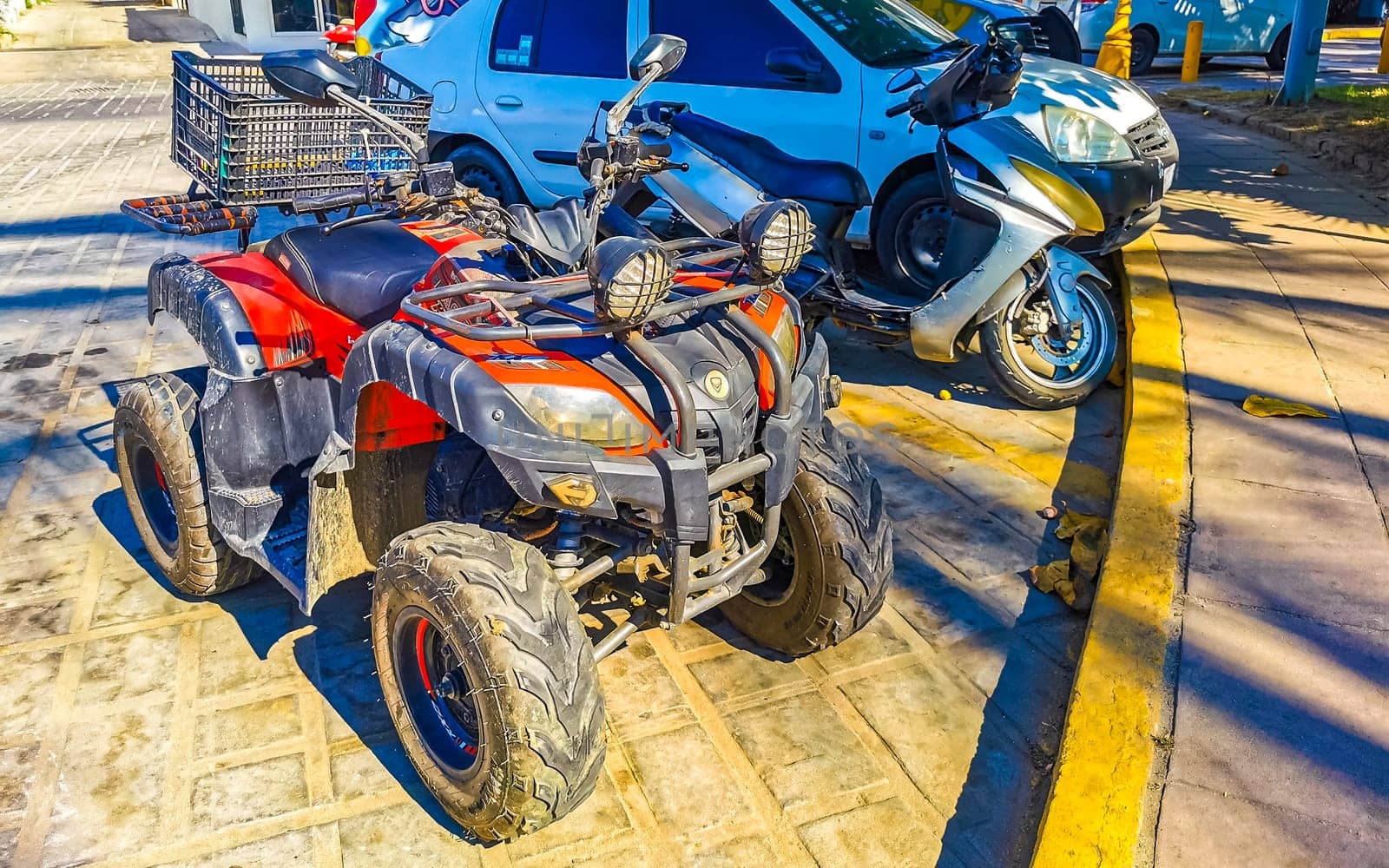 Quad bike bikes atv scooters motorcycles motorbikes outdoor in Zicatela Puerto Escondido Oaxaca Mexico.