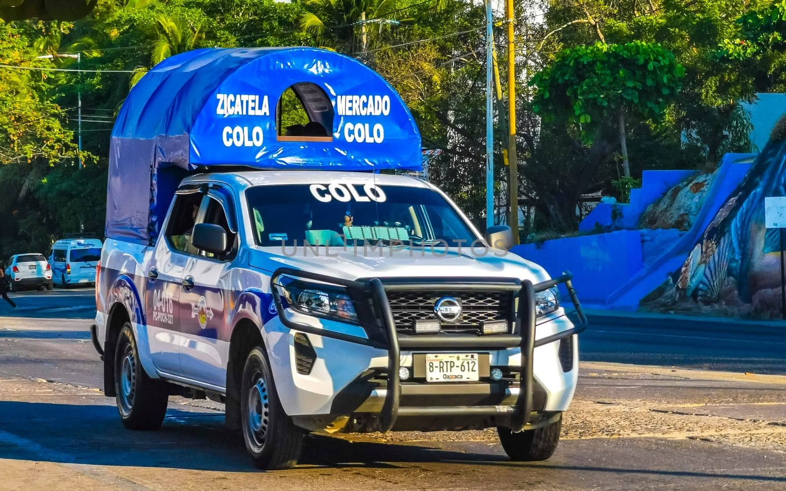 Mexican Colectivo van car transportation pickup truck bus in Mexico. by Arkadij