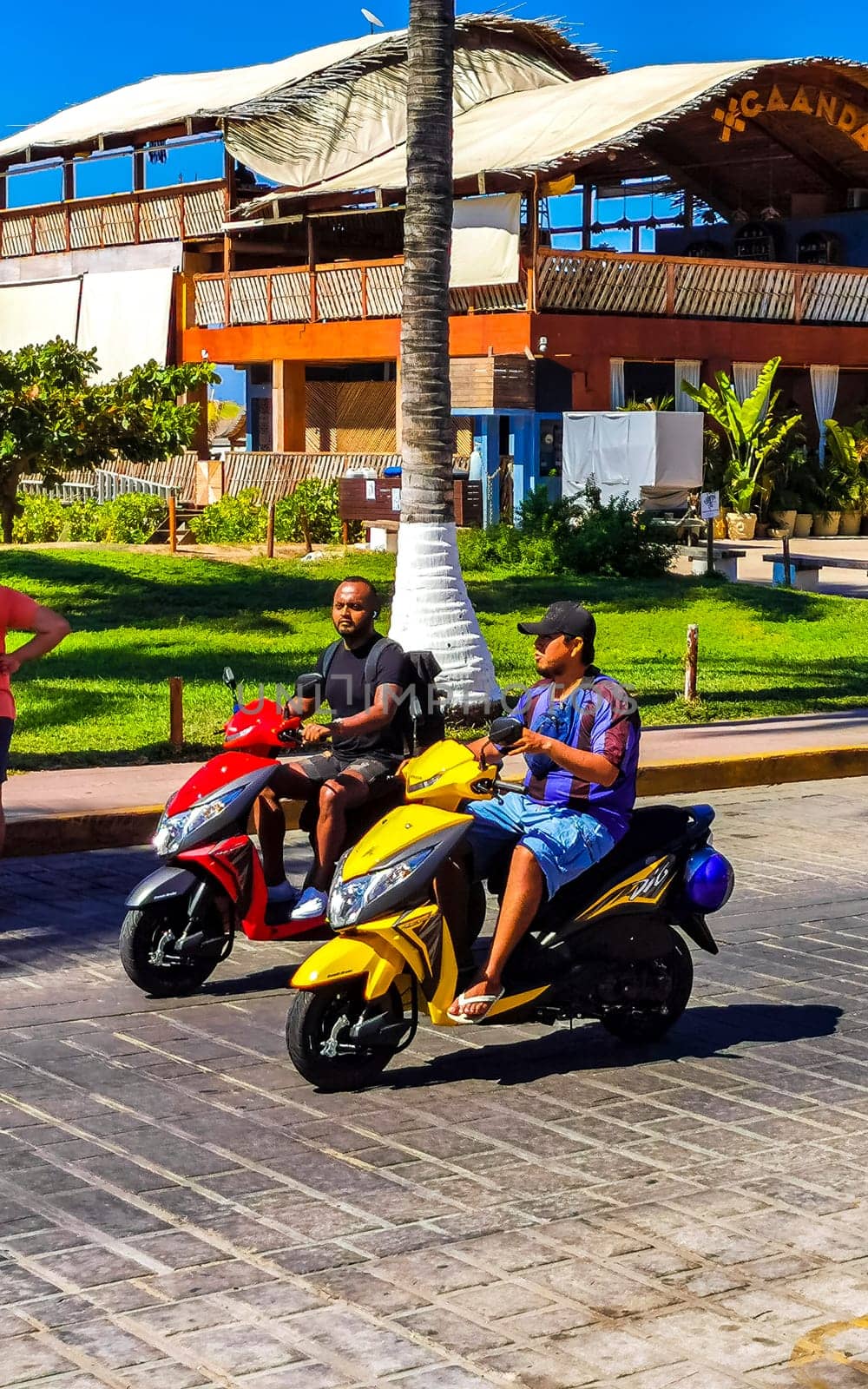 Scooters Motorcycles Motorbikes Outdoor in Puerto Escondido Mexico. by Arkadij