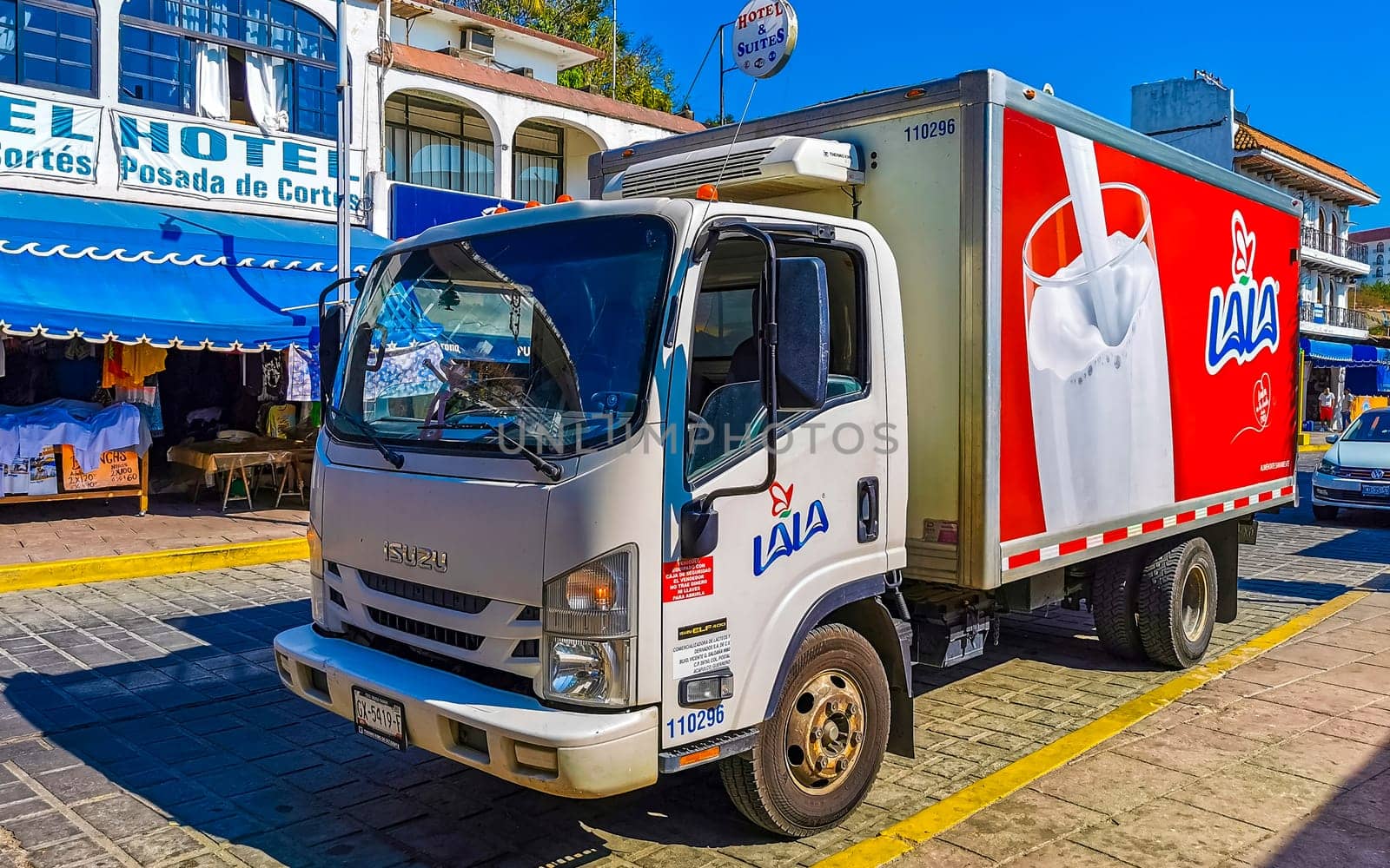 Mexican trucks cargo transporter delivery cars in Puerto Escondido Mexico. by Arkadij