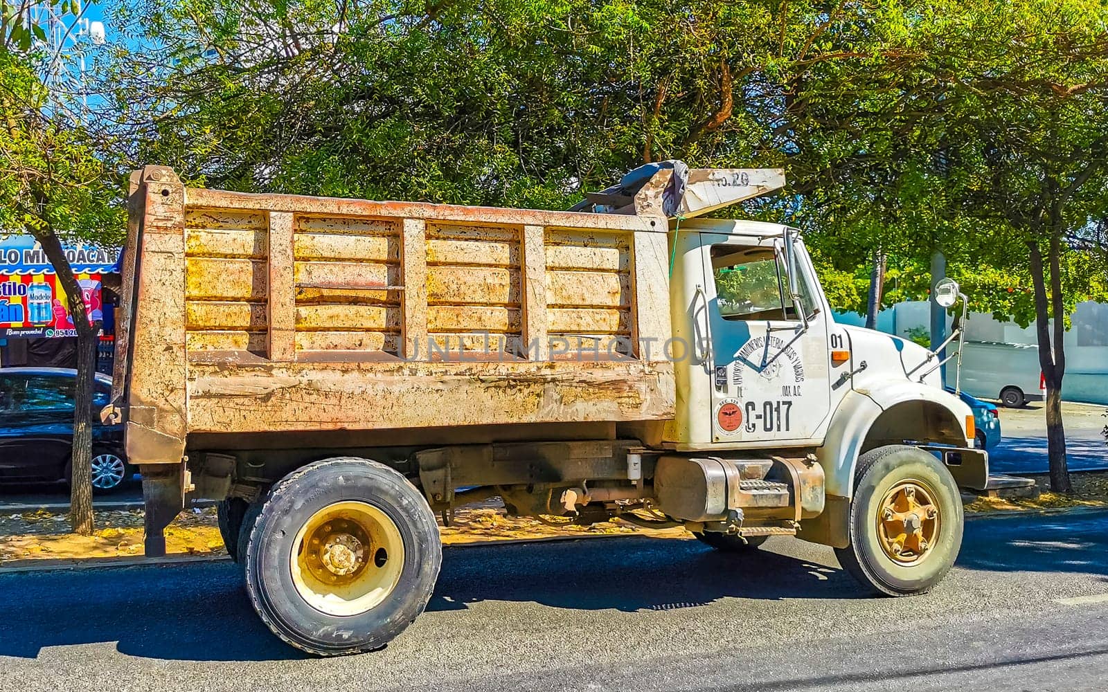 Mexican tipper dumper dump truck trucks transporter in Mexico. by Arkadij