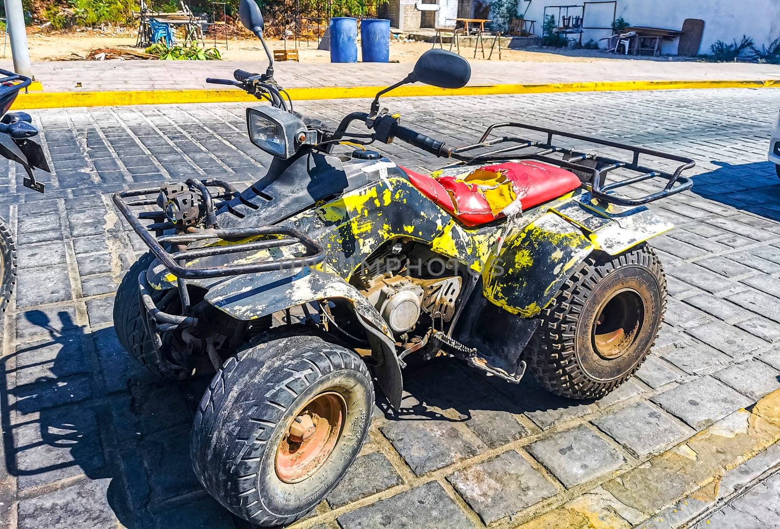 Quad bike bikes atv scooters motorcycles motorbikes outdoor in Zicatela Puerto Escondido Oaxaca Mexico.