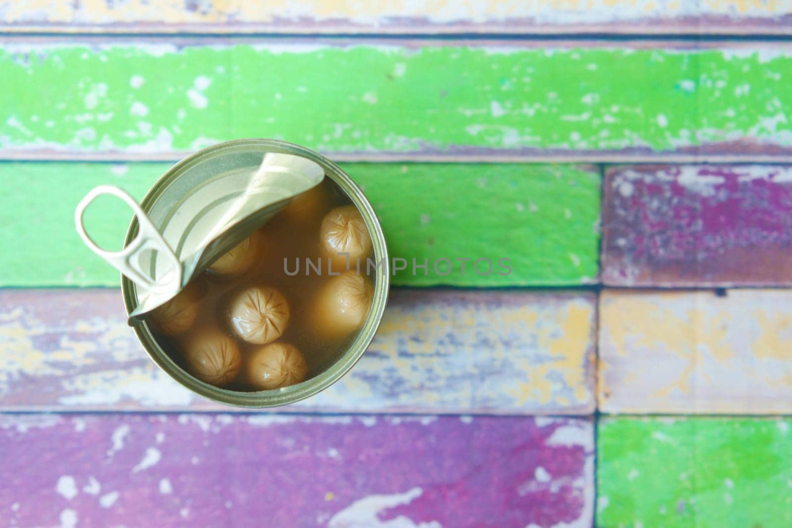 top view of sausage in a tin container .