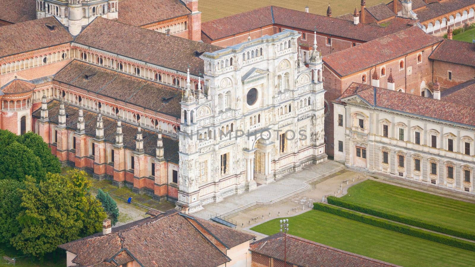 Aerial shot of Certosa di Pavia cathedral a historical monumental complex that includes a monastery and a sanctuary. Pavia ,Italy.