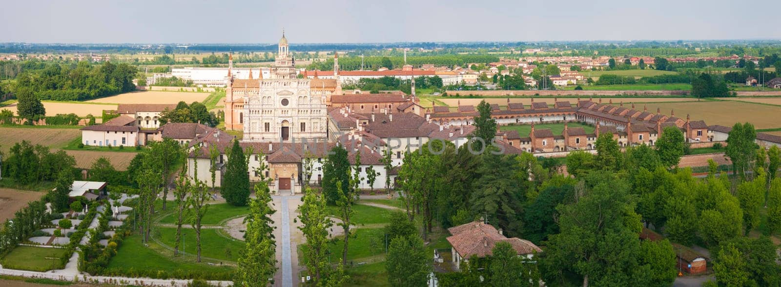 Panorama of Certosa di Pavia cathedral at sunny day by Robertobinetti70