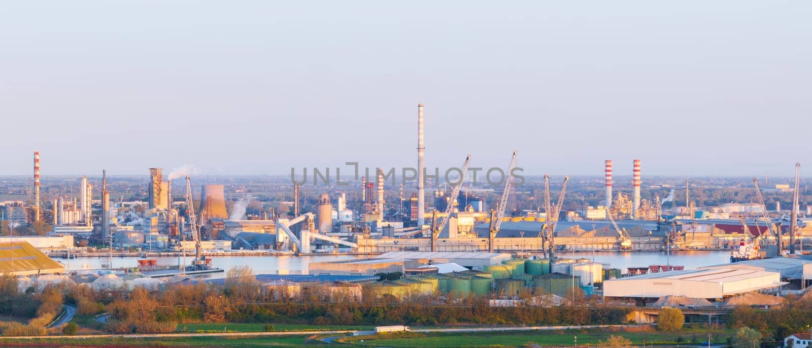 Wonderful aerial view of the industrial and port area of Ravenna at sunrise by Robertobinetti70