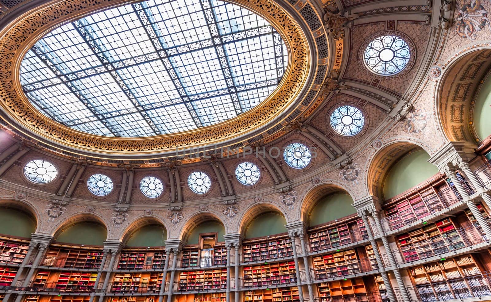 PARIS, FRANCE, OCTOBER 20, 2022 : Oval reading room in National Library, Richelieu site, Paris, france, built by architects Jean-Louis Pascal. and Alfred Recoura, from year 1897 to year 1932