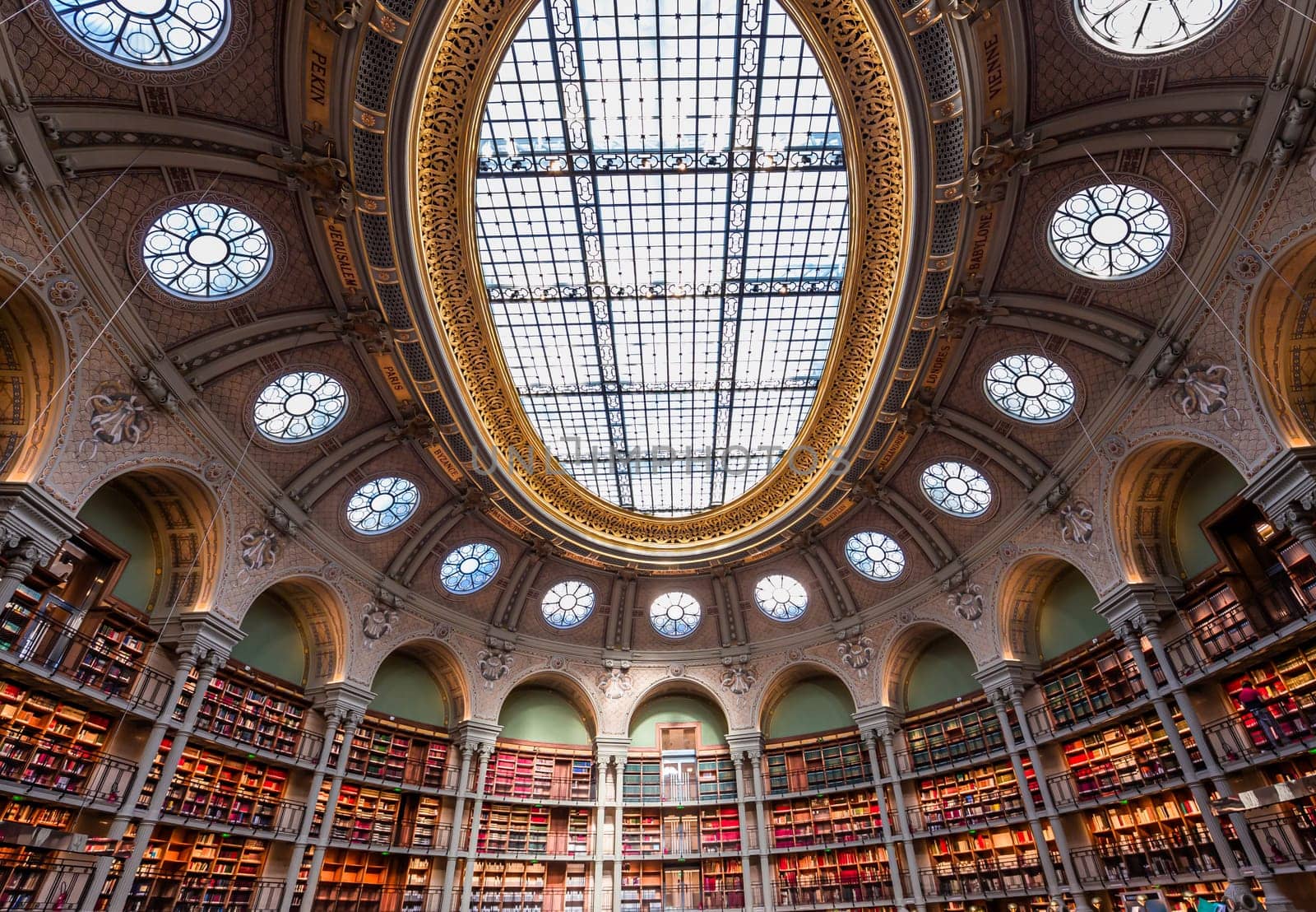 PARIS, FRANCE, OCTOBER 20, 2022 : Oval reading room in National Library, Richelieu site, Paris, france, built by architects Jean-Louis Pascal. and Alfred Recoura, from year 1897 to year 1932