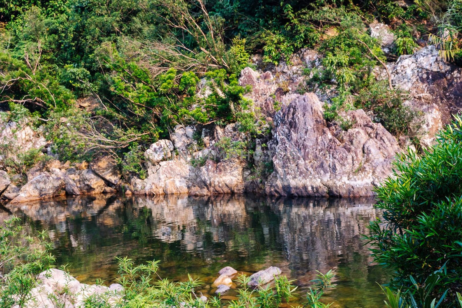 Central Vietnam. Rocks mountains river. Reflections in water. Magic nature energy Fresh Freedom Calm.