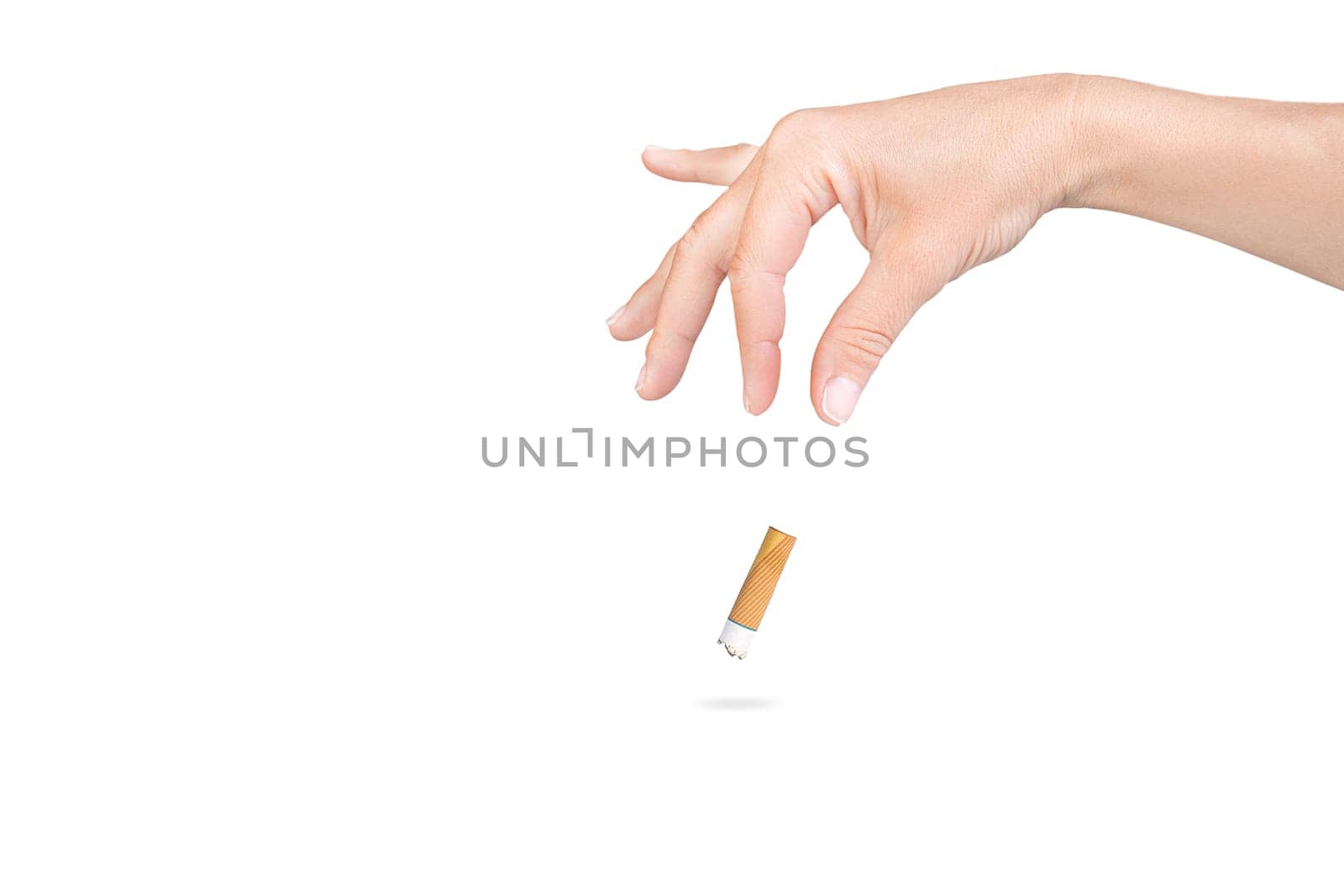 female hand throwing a cigarette on isolated white background.