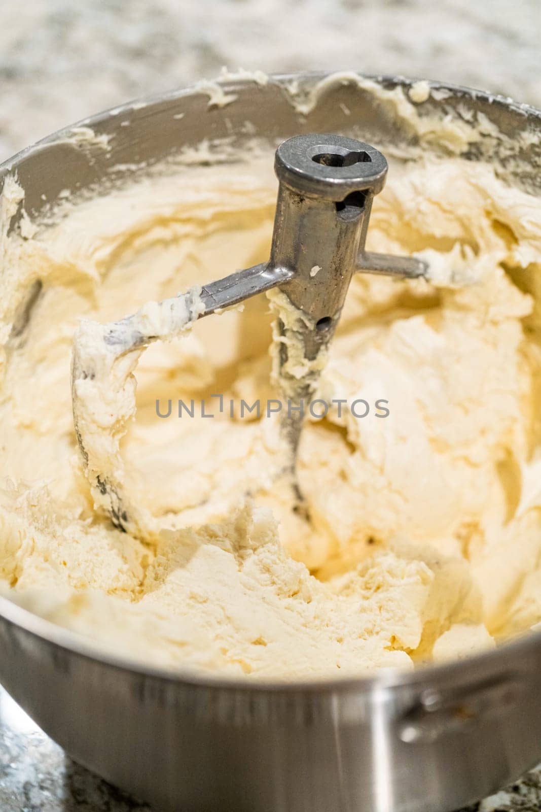 Creamy Buttercream Frosting Whipped in Stand Mixer Bowl by arinahabich