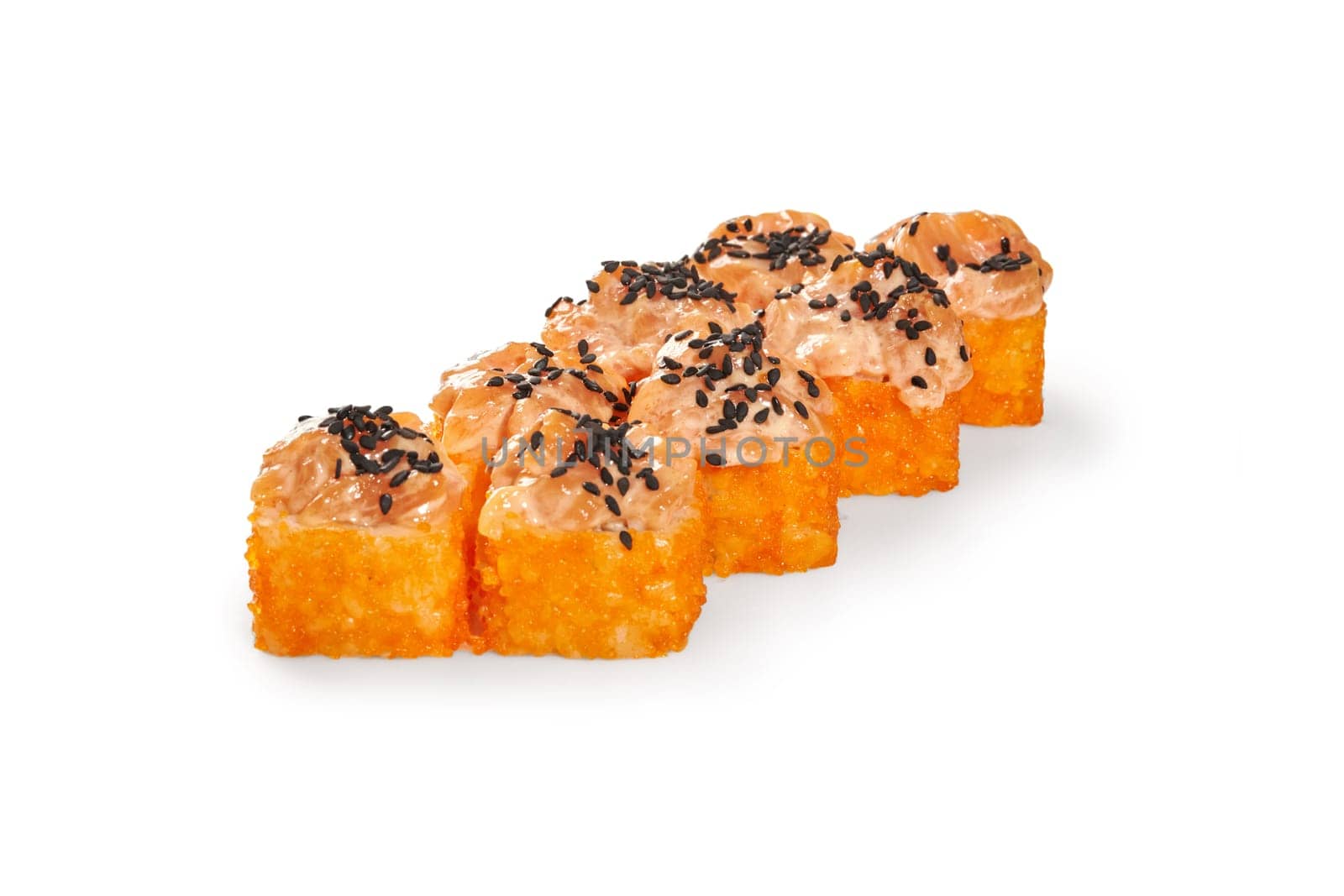 Colorful appetizing rolls coated with tobiko roe topped with creamy salmon tartare and black sesame, isolated on white background. Japanese sushi bar menu concept