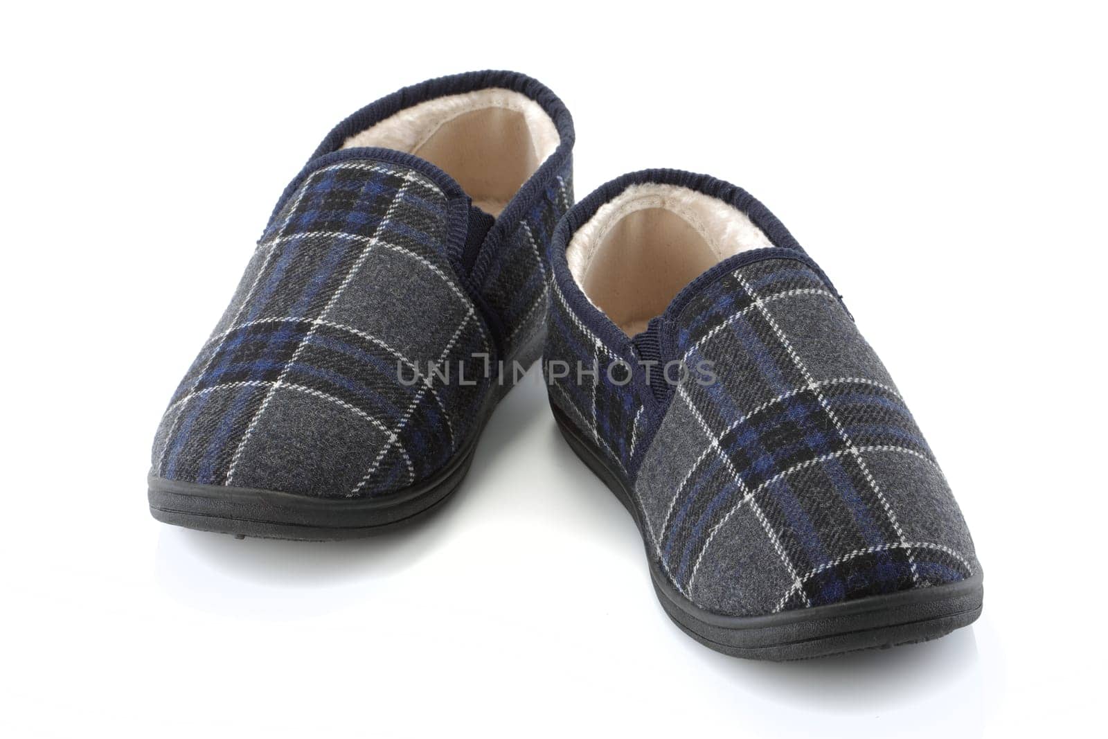 A pair of mens slippers on white background