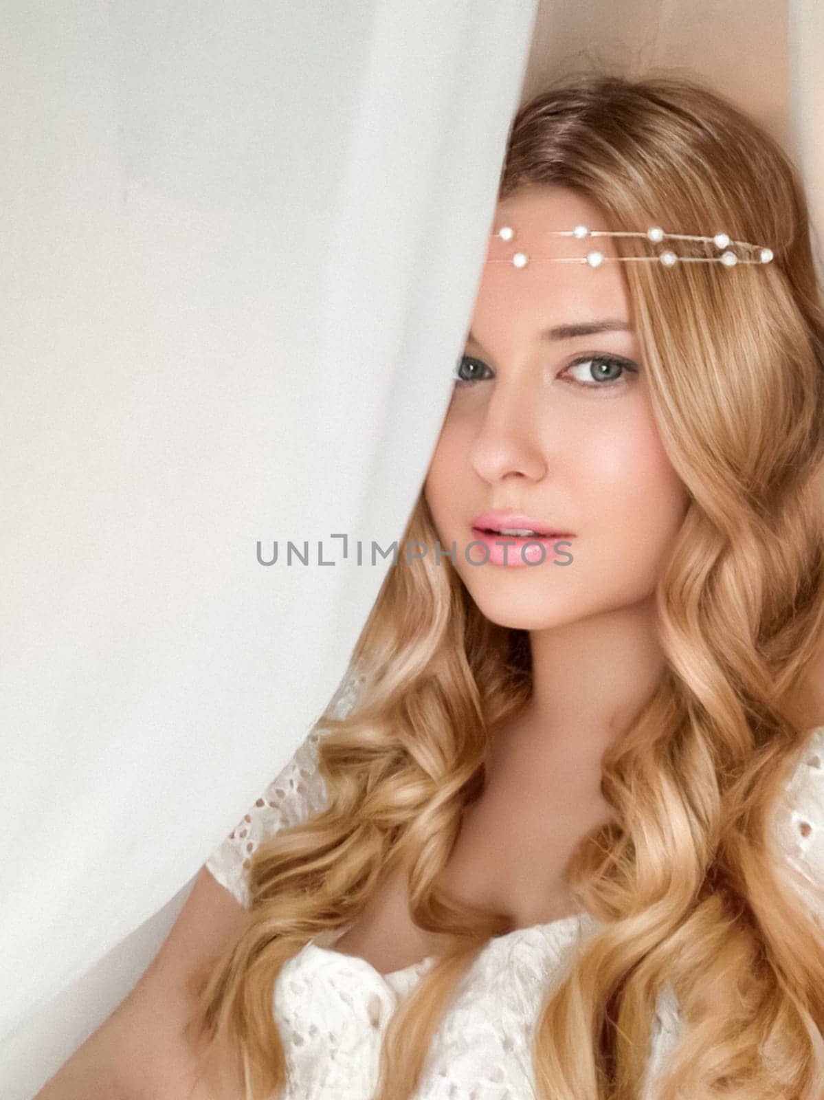 Beautiful bridal look, bride with long hair, wearing pearl tiara jewellery and beauty makeup, blonde woman with curly hairstyle, face portrait for wedding and fashion style by Anneleven