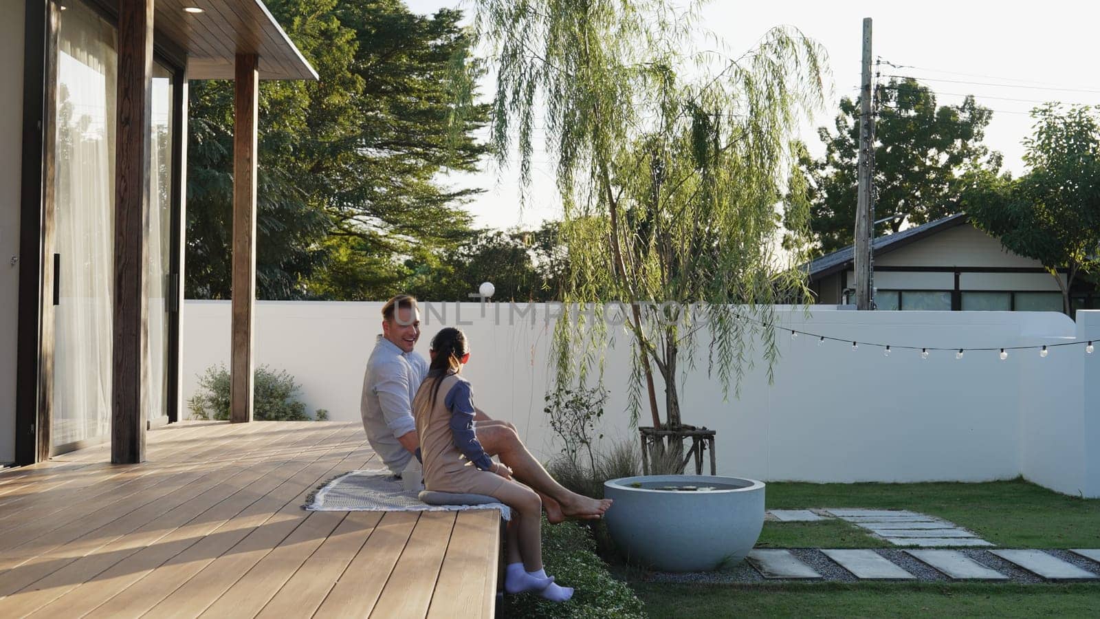 Father and daughter together watch interesting natural view outdoor. Parent use outdoor activity as way to communicate young generation about environment awareness cross generation gap. Divergence.