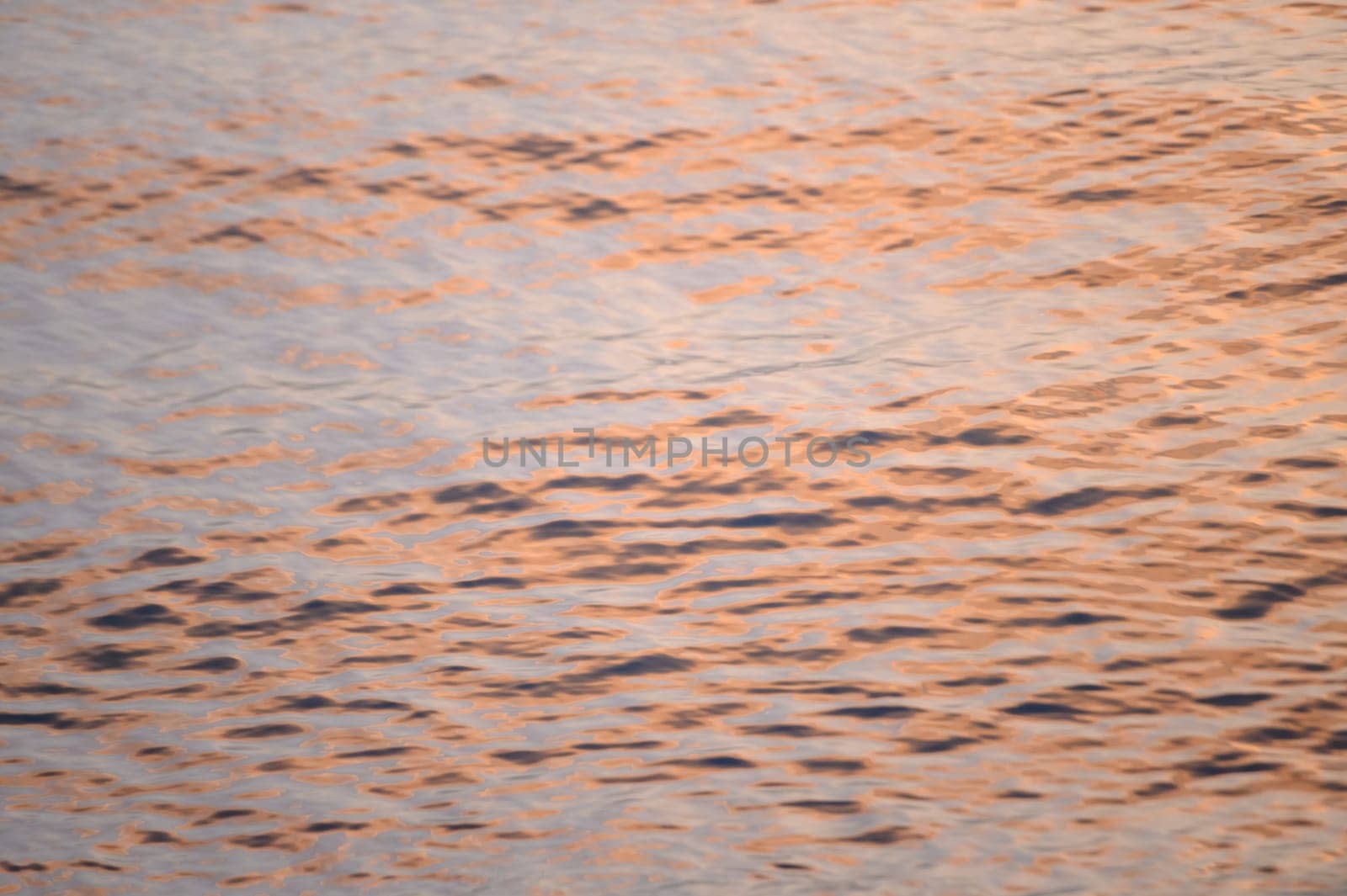 reflection of the sunset in the waters of the Mediterranean Sea