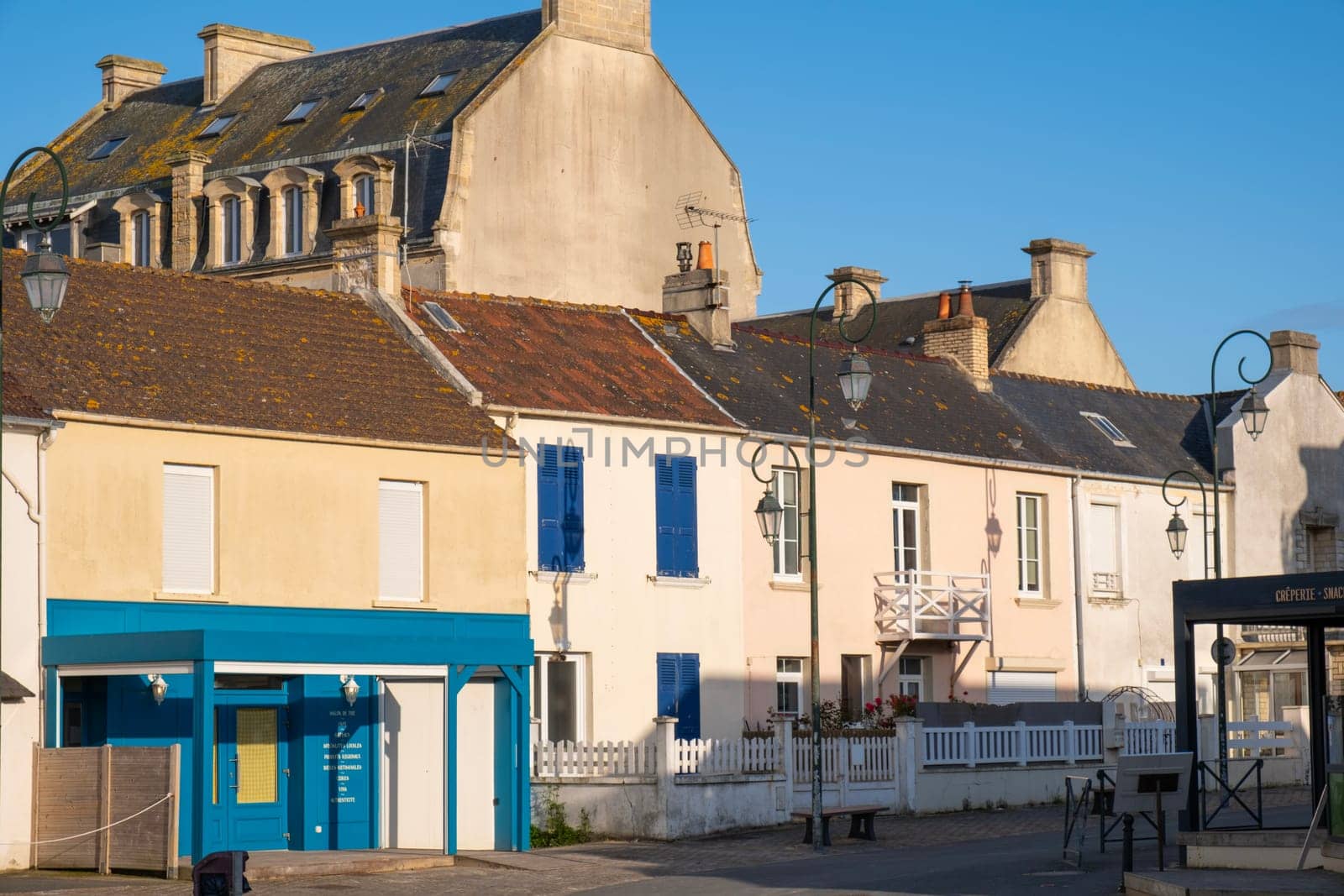 Normandy village of Gold Beach France. Tourism and architectural history. Seawall and promenade. High quality photo